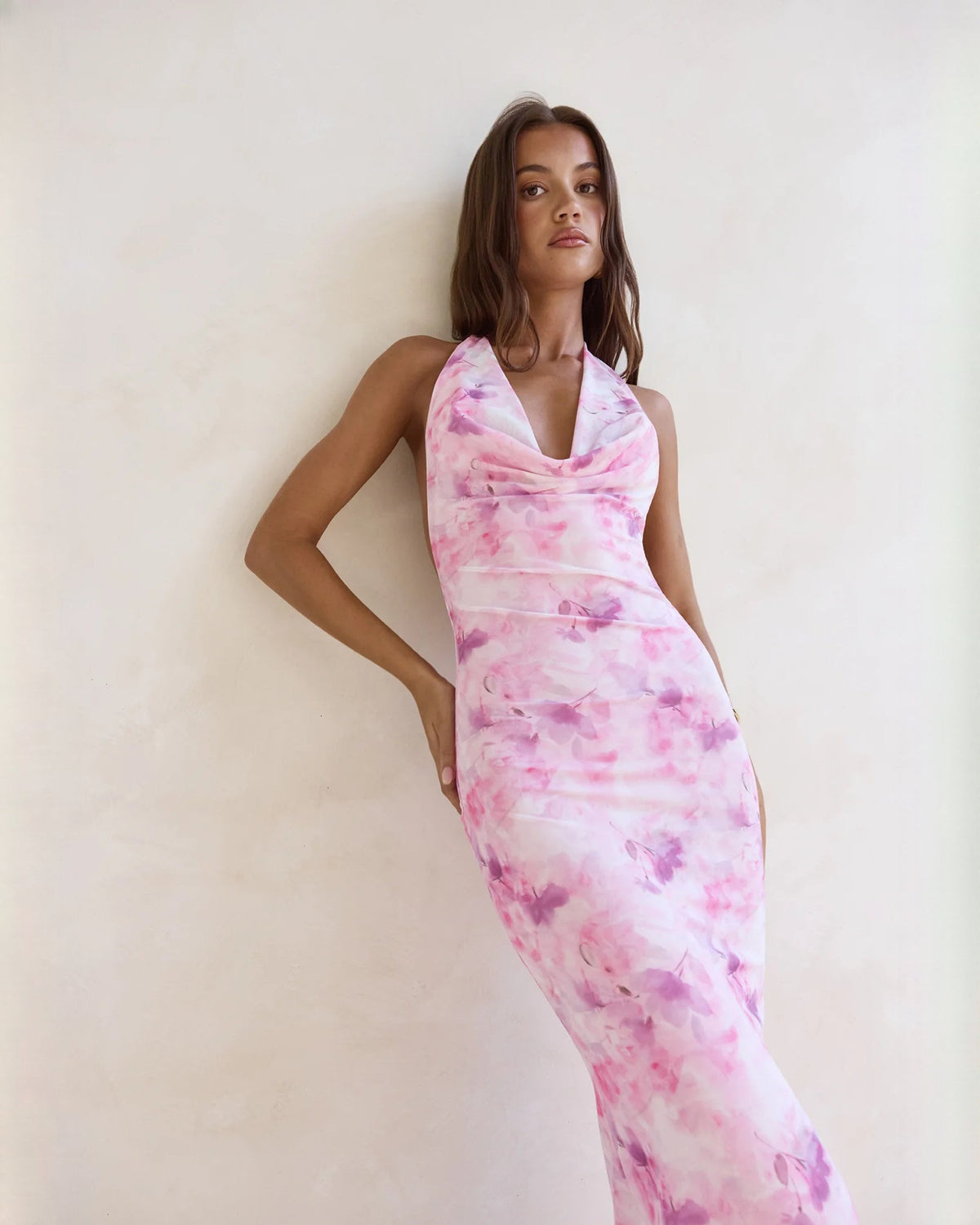 Pink floral halter neck maxi dress with draped V-front bodice and fitted waist