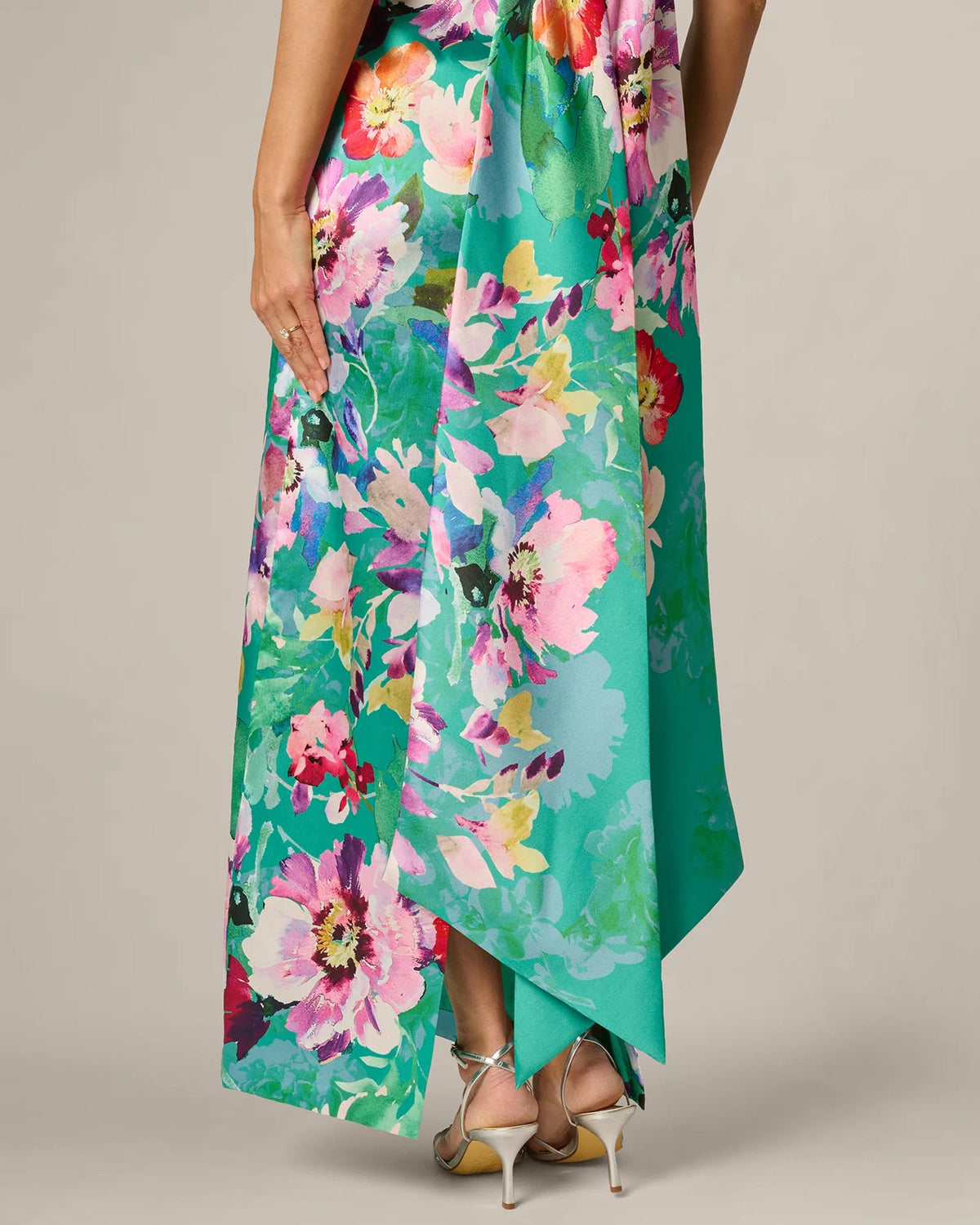 Green floral maxi dress with flowing draped hem and long sheath fit