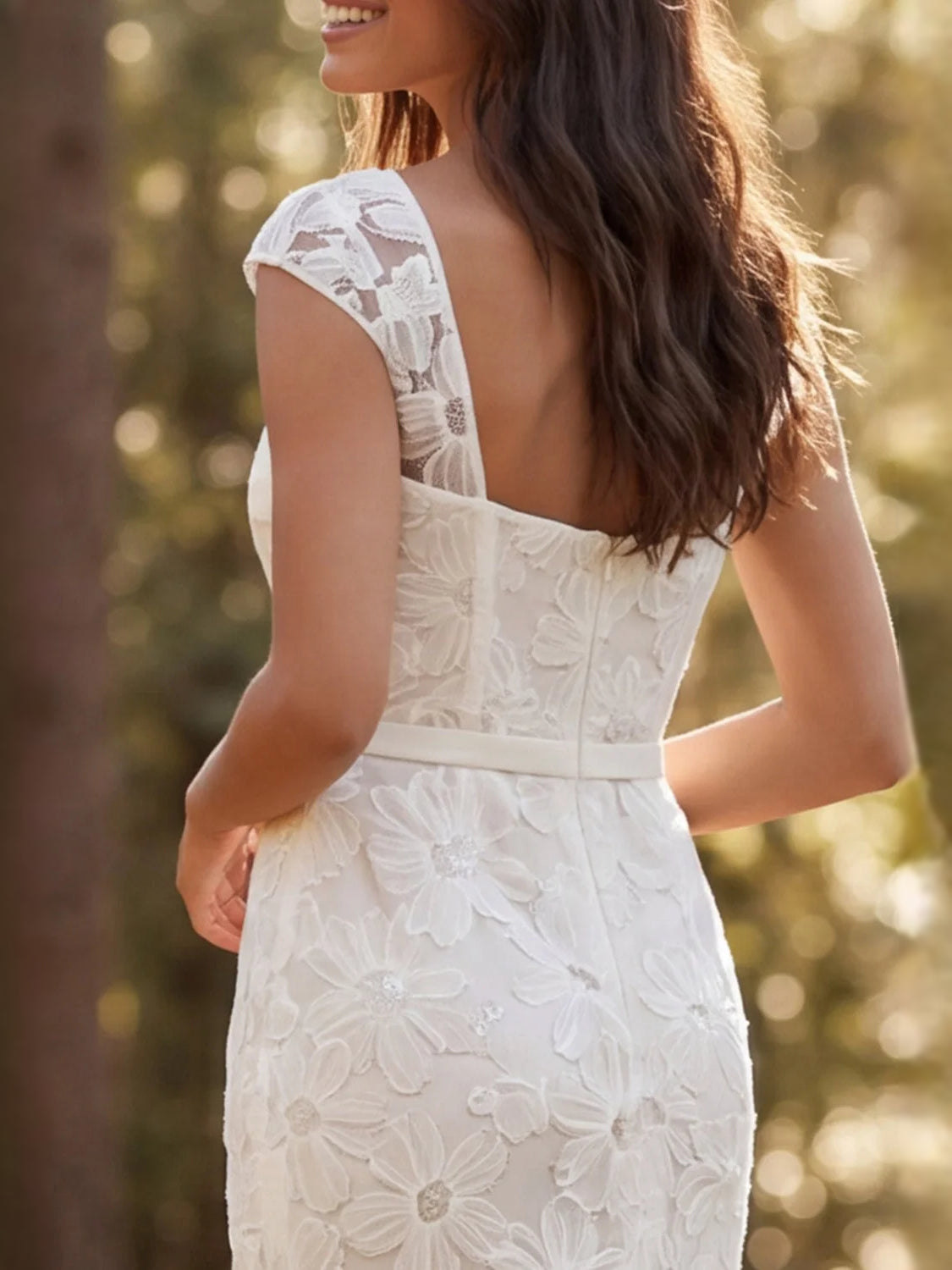 Ivory floral lace wedding dress with square back and fitted mermaid silhouette