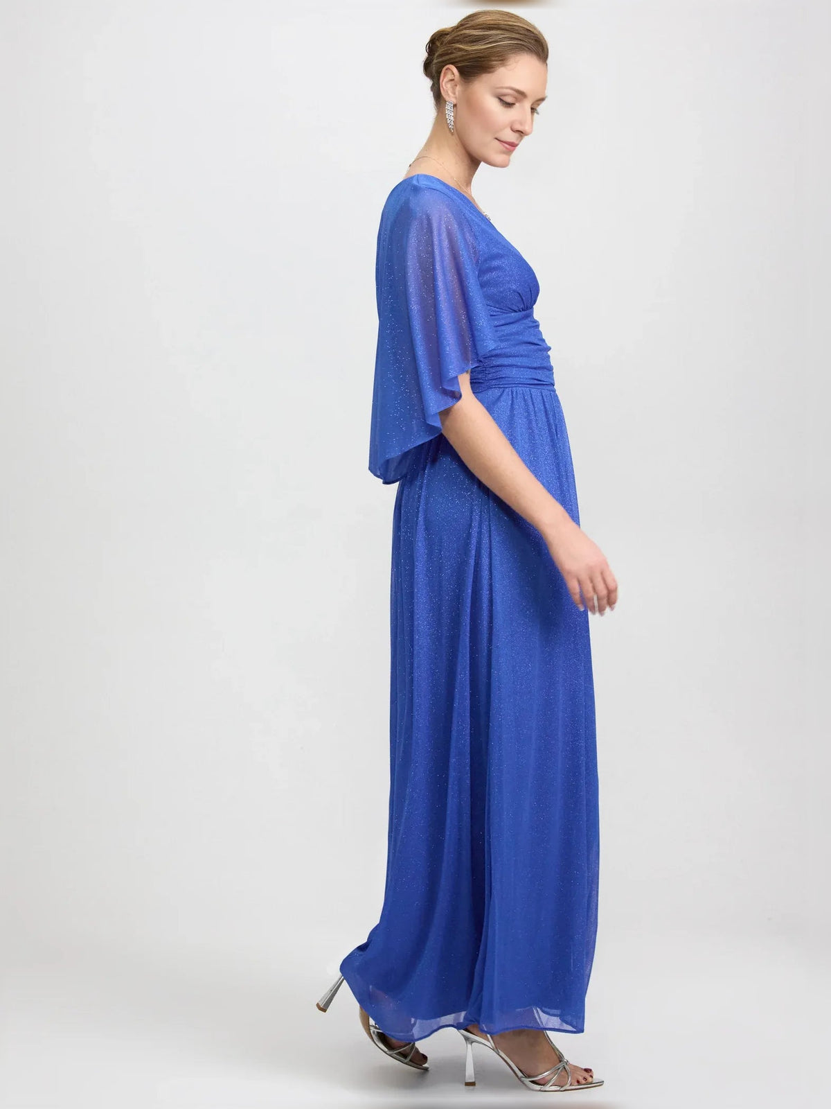 Blue chiffon V-neck A-line dress side view, ruched waist, flutter sleeves