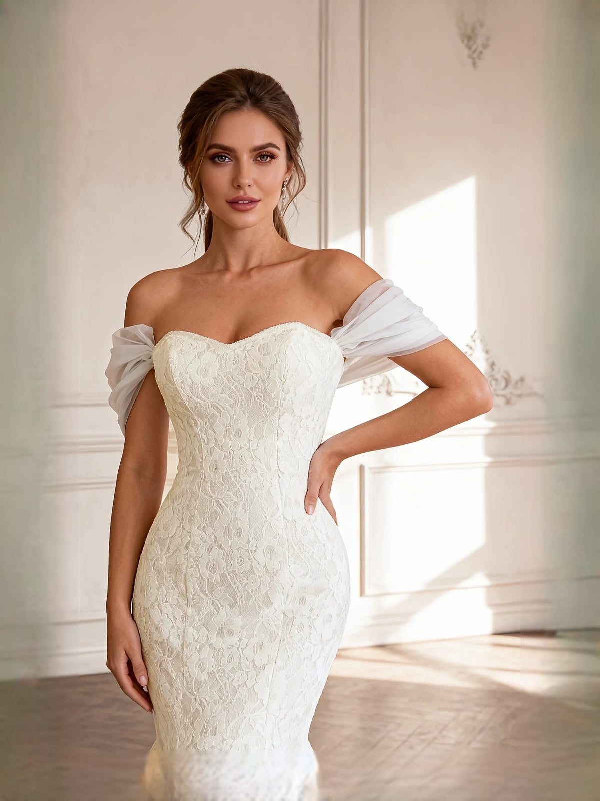 Ivory sweetheart corset-style lace wedding dress with off-shoulder draped sleeves