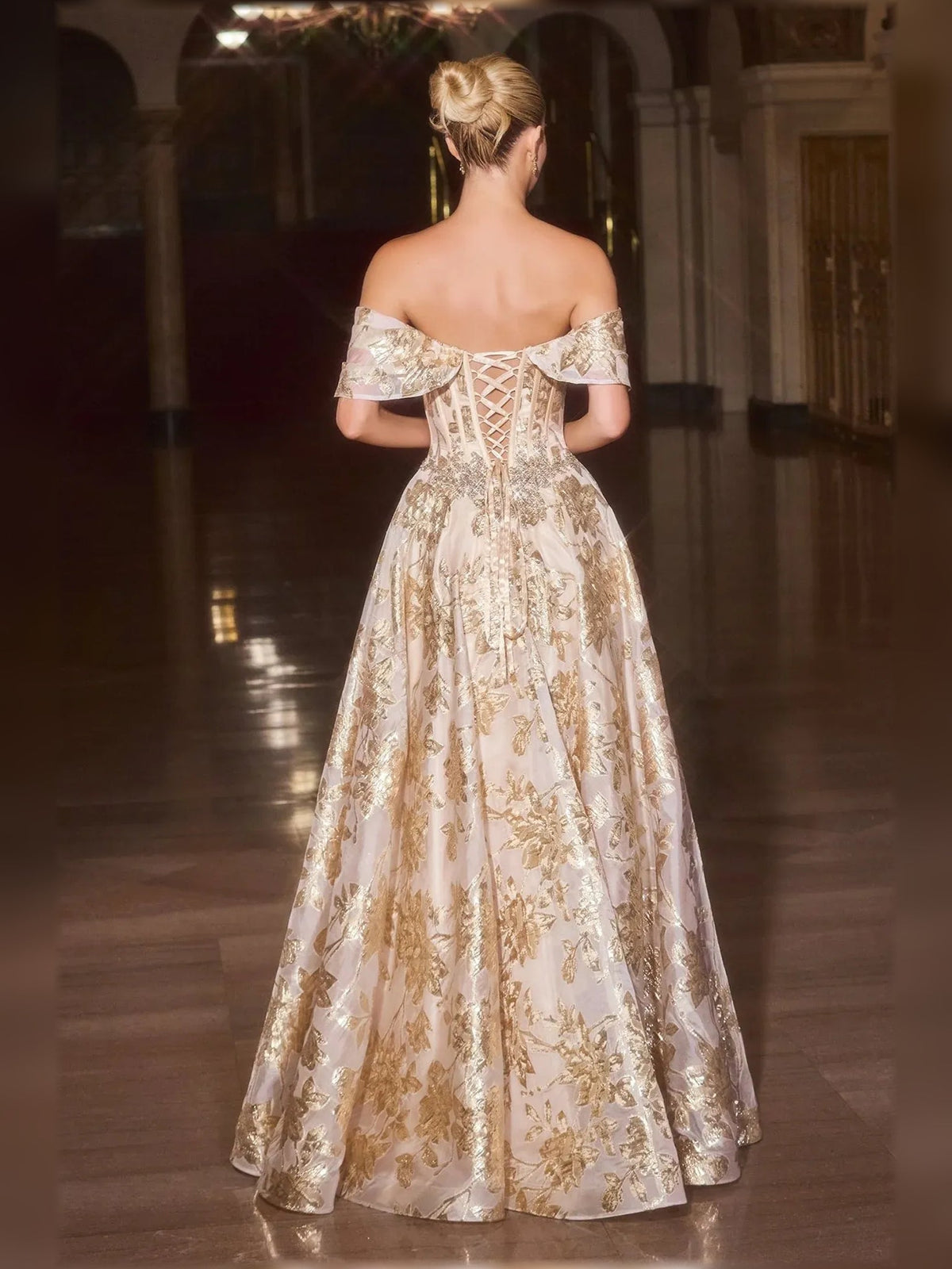 Gold off-shoulder sweetheart ball gown from back view with beaded corset and full skirt