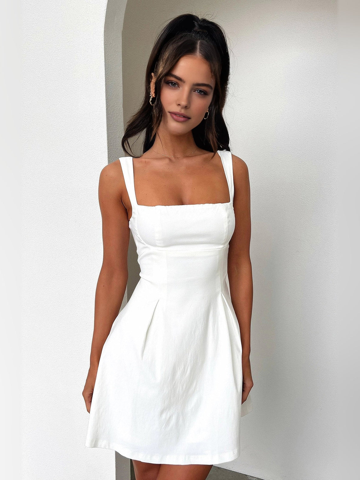 Ivory square-neck A-line mini dress with wide skirt and spaghetti straps