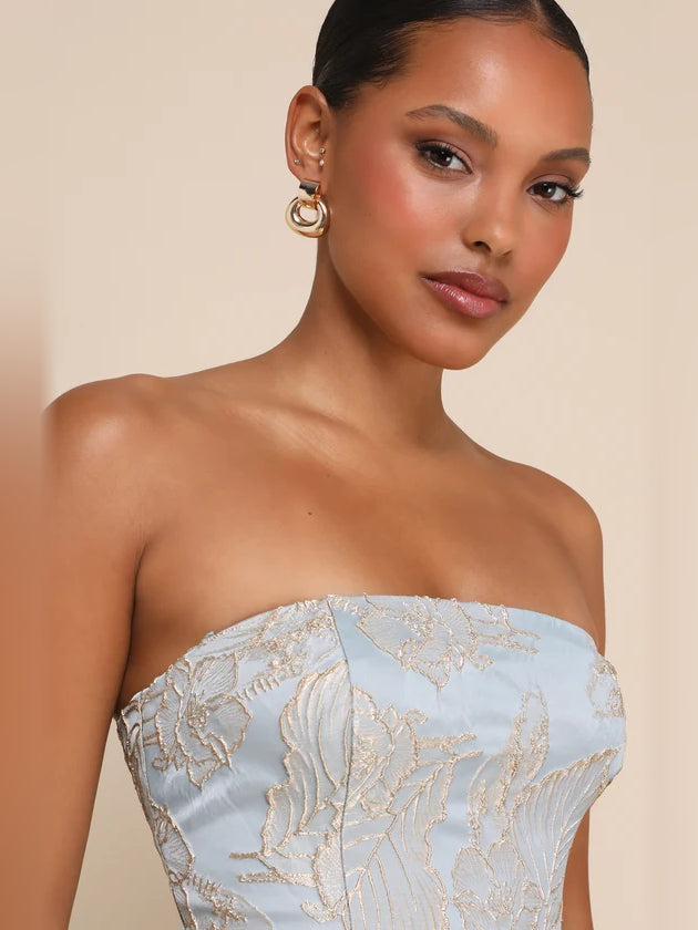 Strapless slate blue homecoming dress close-up with gold floral embroidery