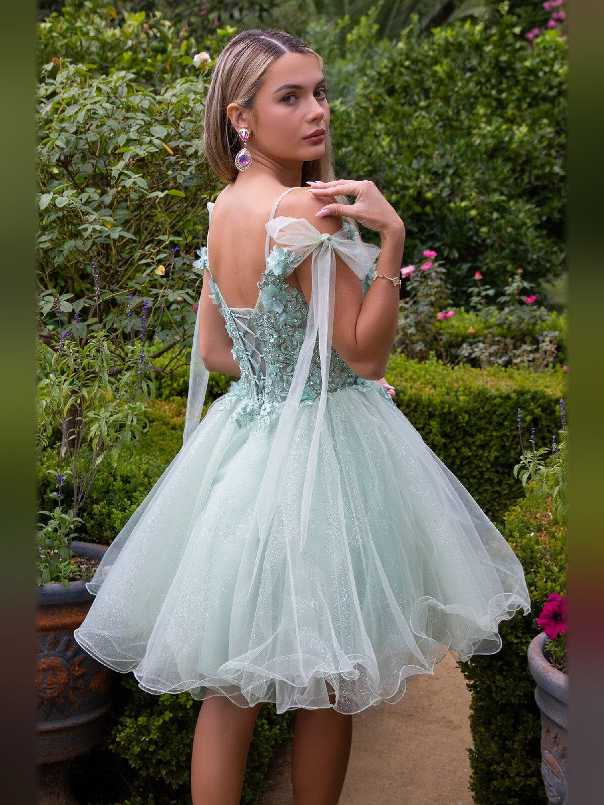 Short tulle A-line dress with floral lace bodice, bow shoulders, and open back