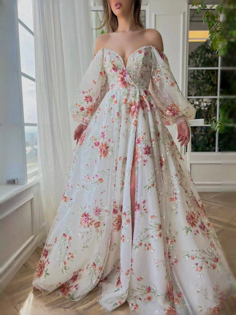 Floral embroidered tulle floor-length prom dress with sweetheart neckline and flowing A-line skirt.