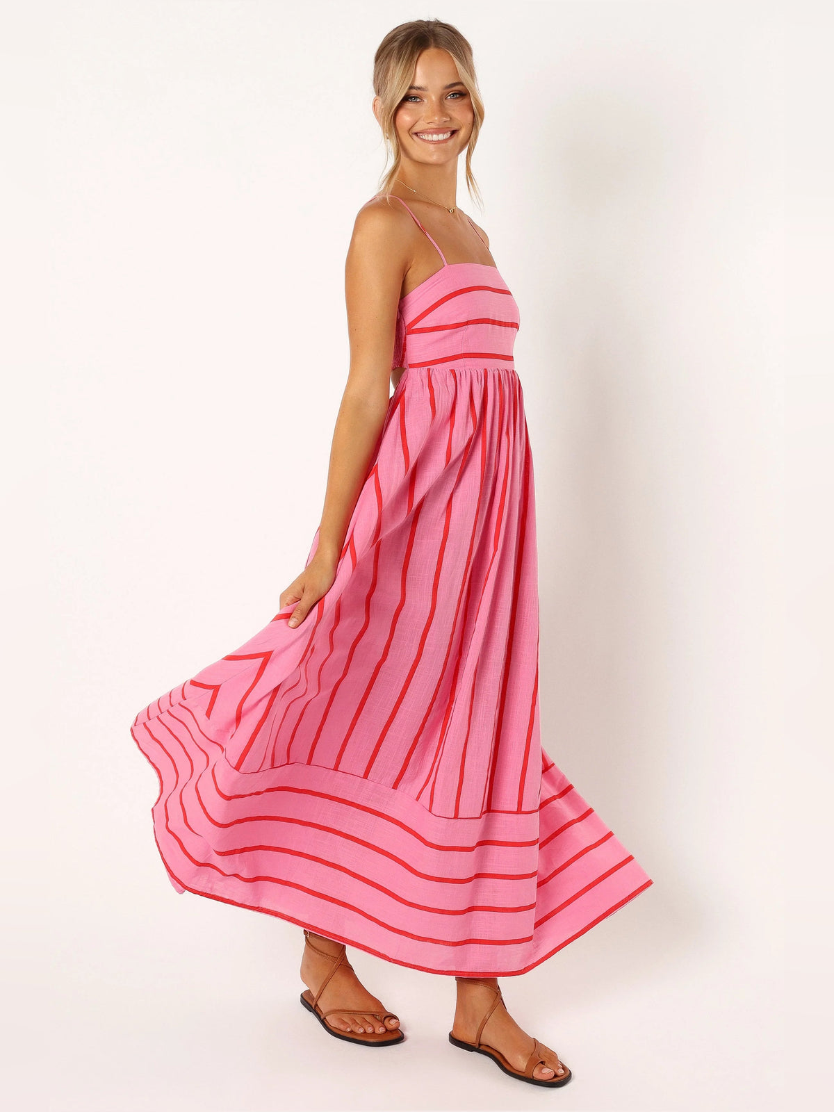Red a-line maxi formal dress with printed pattern, alternate full-length view showing the skirt