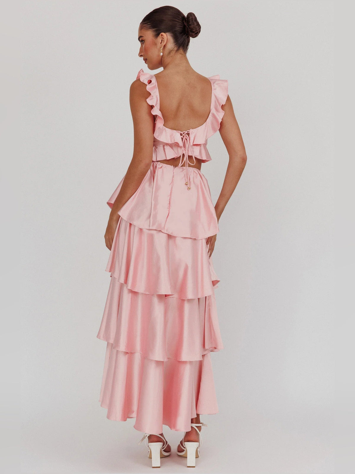 Pink tiered ruffle maxi dress back view with lace-up waist tie