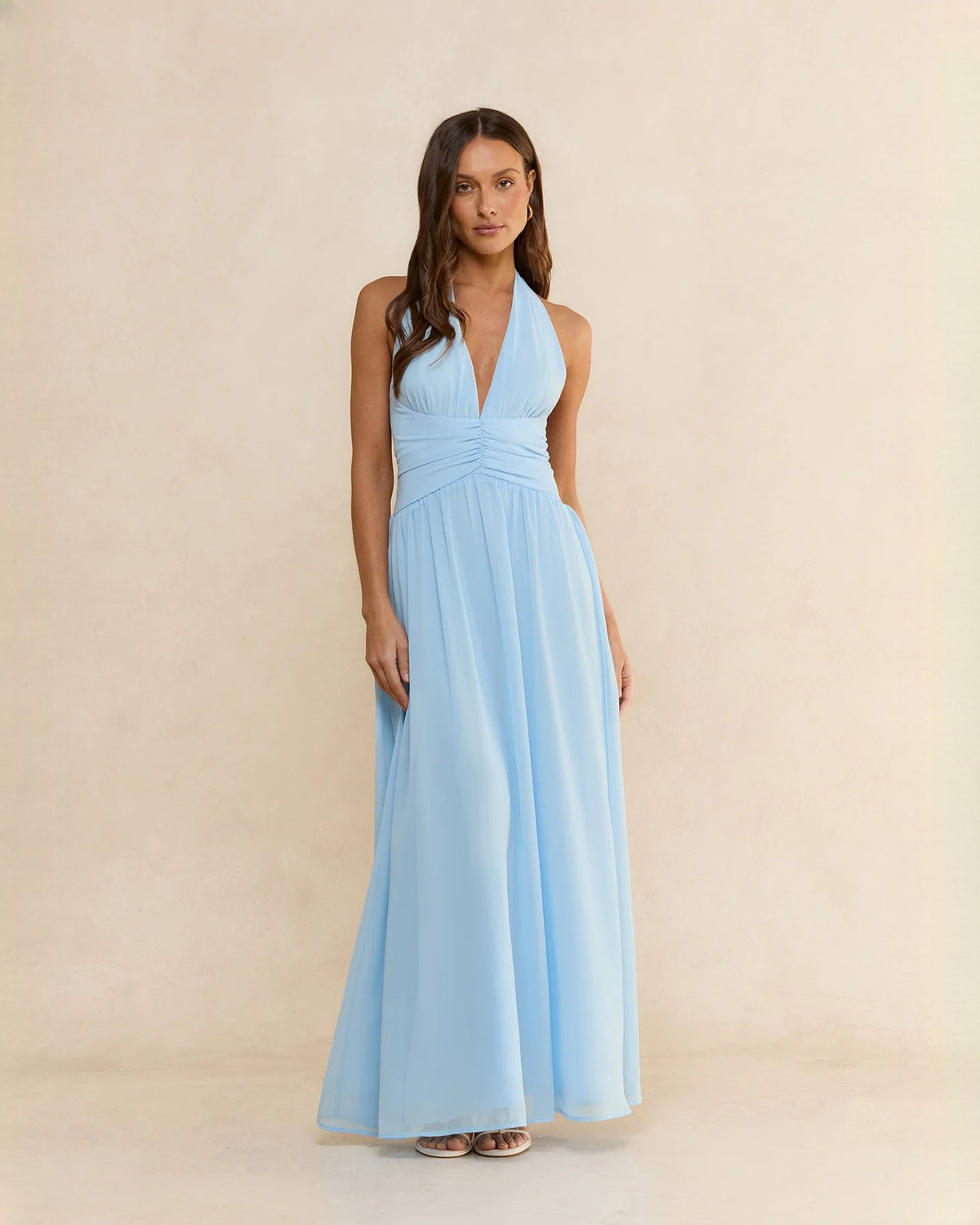 Light blue halter A-line maxi chiffon dress with pleated skirt and gathered waist
