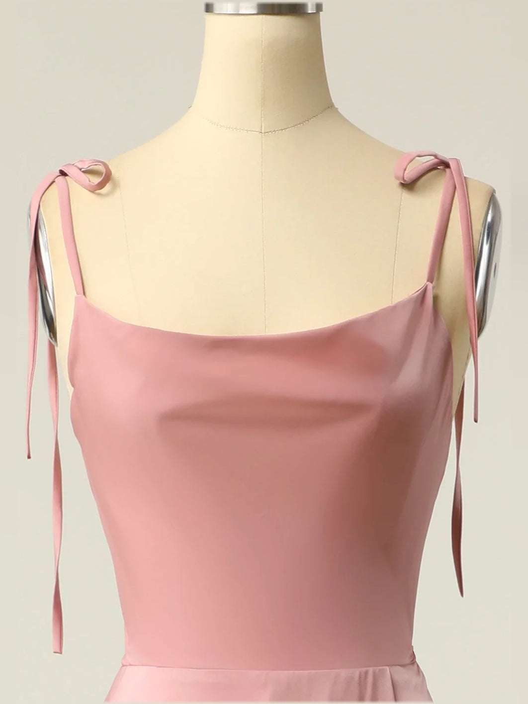 Dusty pink satin cowl-back bodice with tie spaghetti straps and gathered waist seam