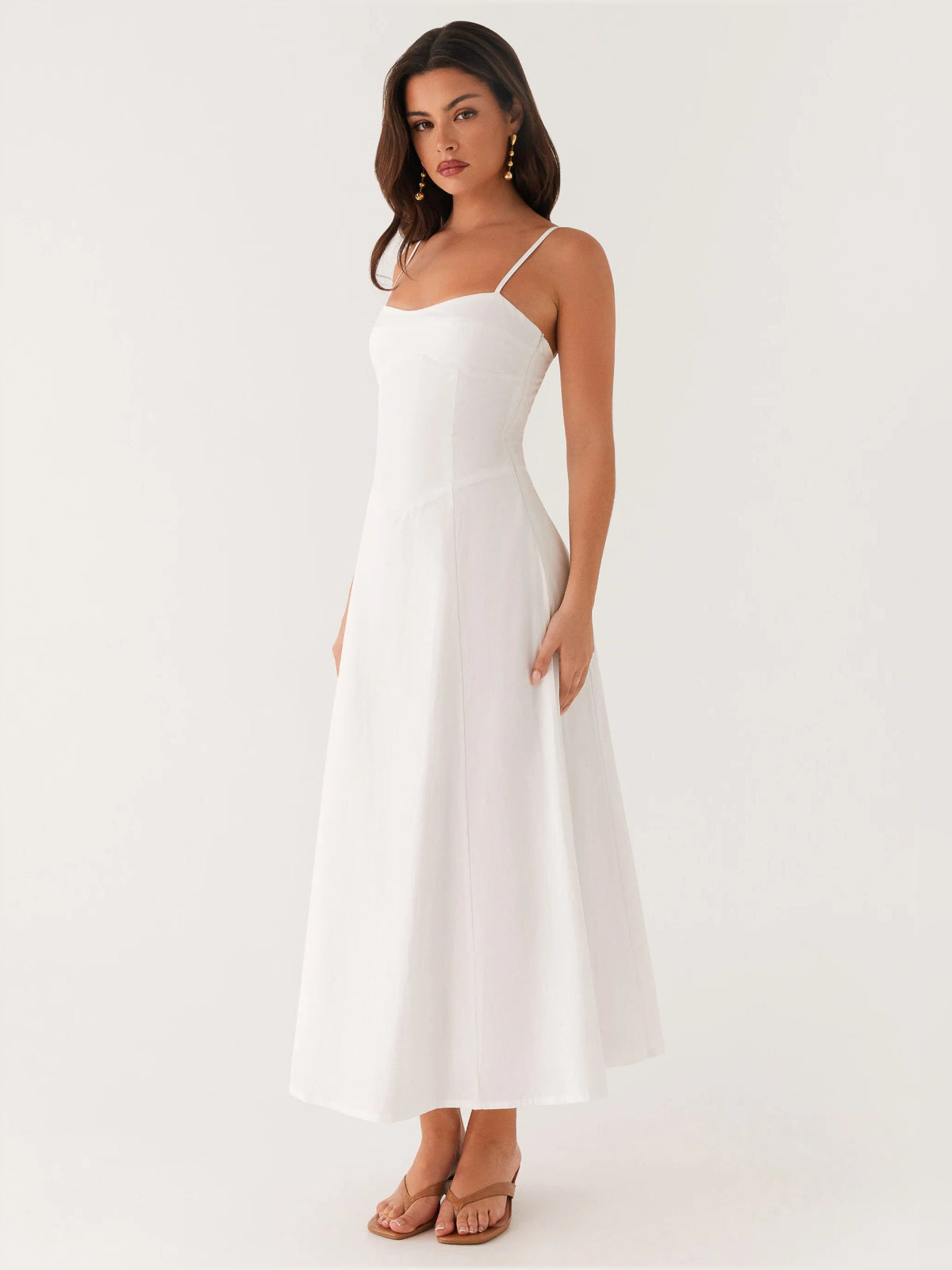 White midi formal dress with spaghetti straps, scoop neckline, A-line skirt