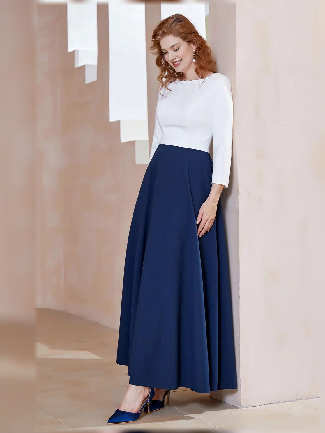 Mother of the bride A-line dress with boat neckline, navy skirt and long white sleeves