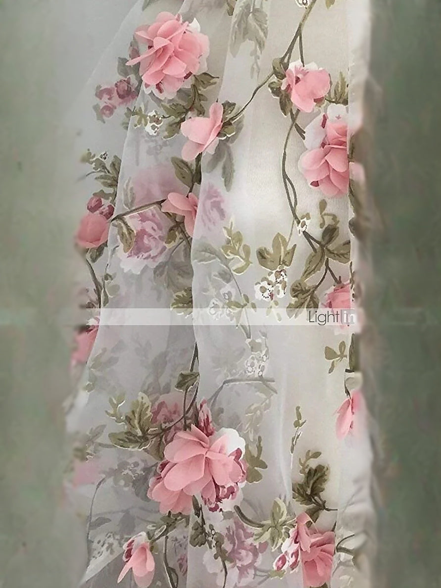 Pearl pink layered tulle dress with pink floral appliqués