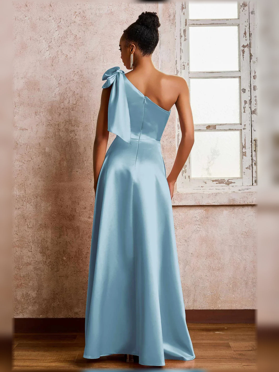 Dusty blue one-shoulder satin A-line formal dress with side slit and bow strap detail