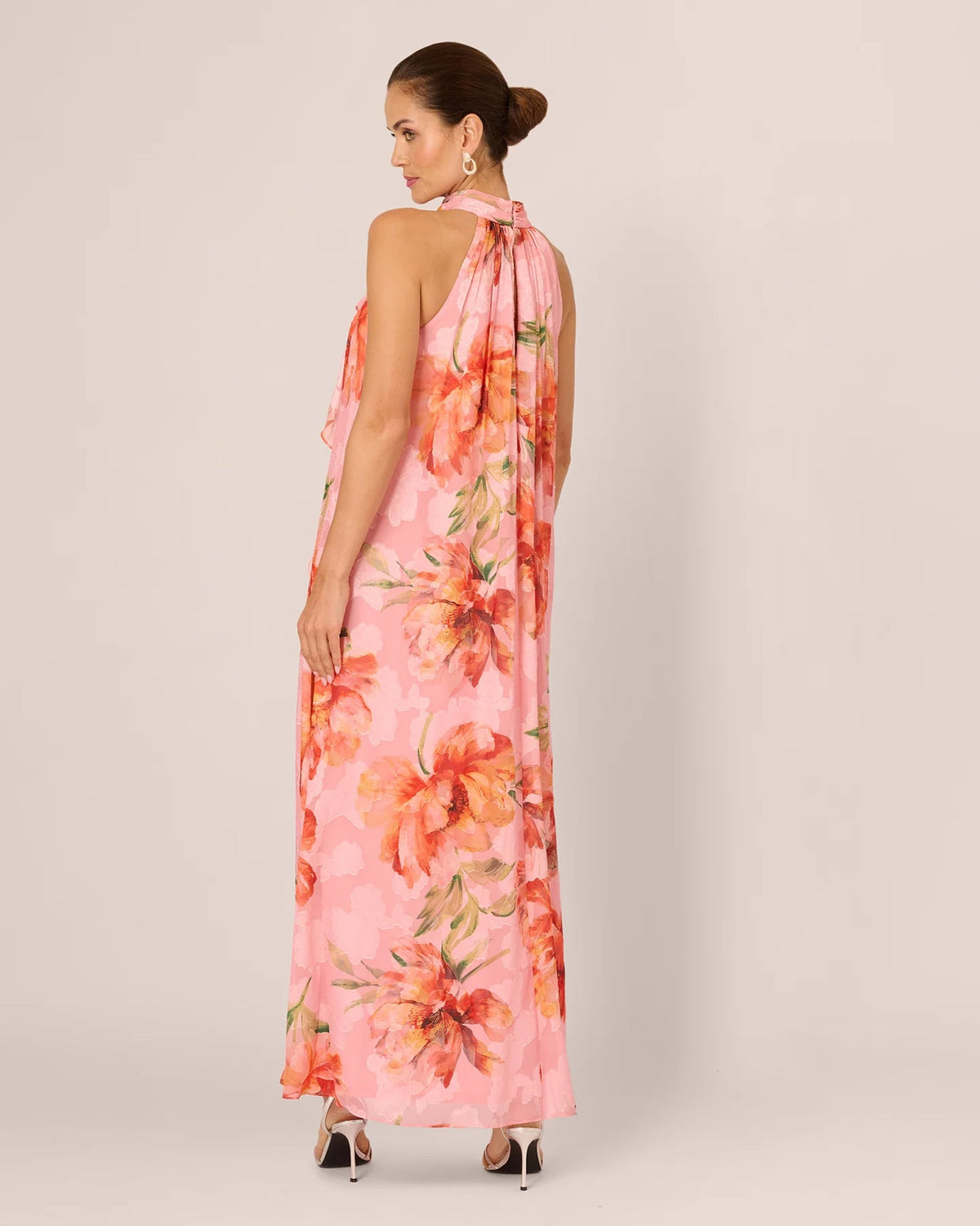Pink floral halter maxi dress with open back and tied neck detail