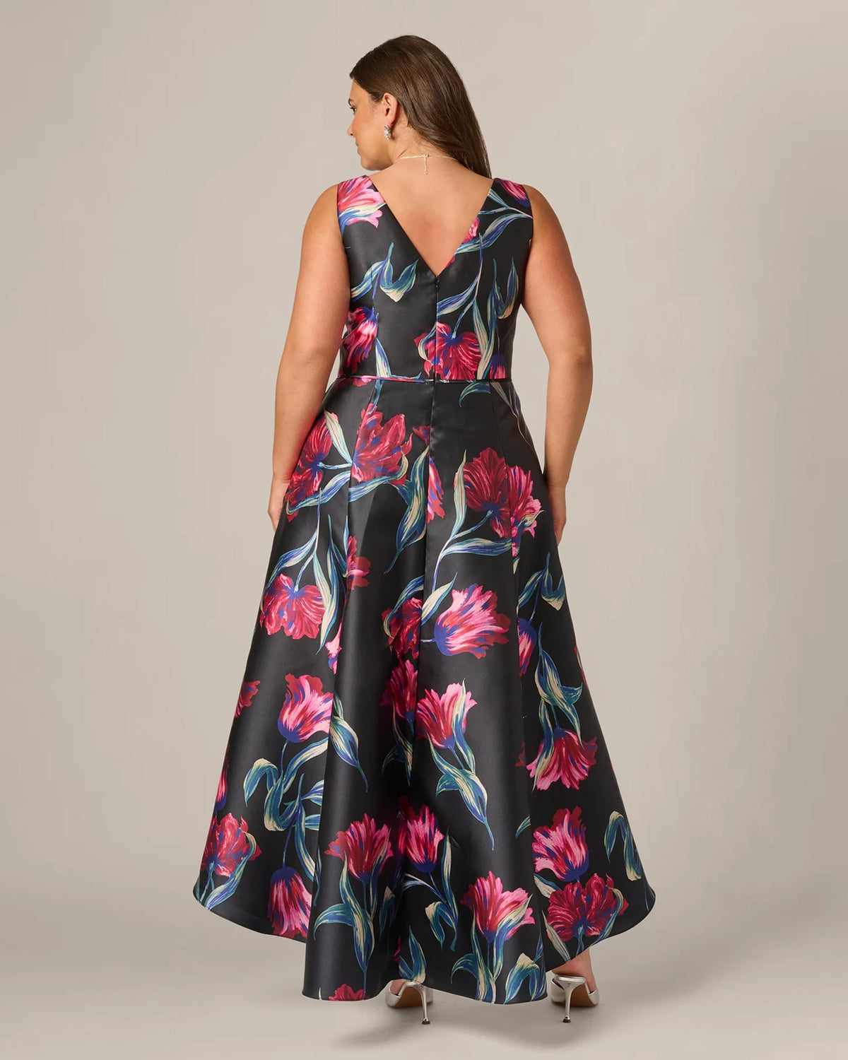 Floral A-line maxi dress back view with V-back and waist tie, black with pink and blue blooms