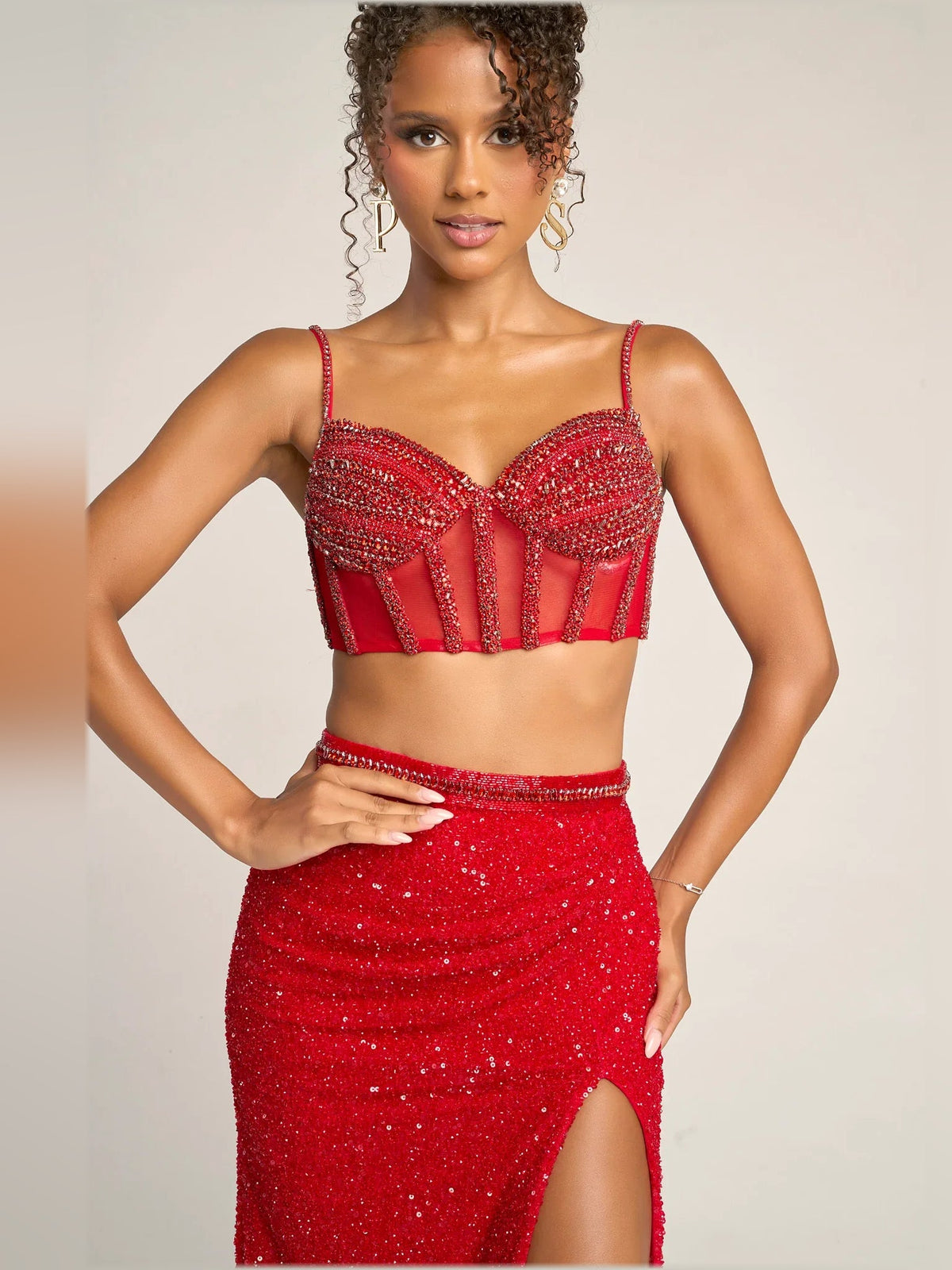 Red sequin spaghetti-strap crop top and matching maxi skirt with front slit