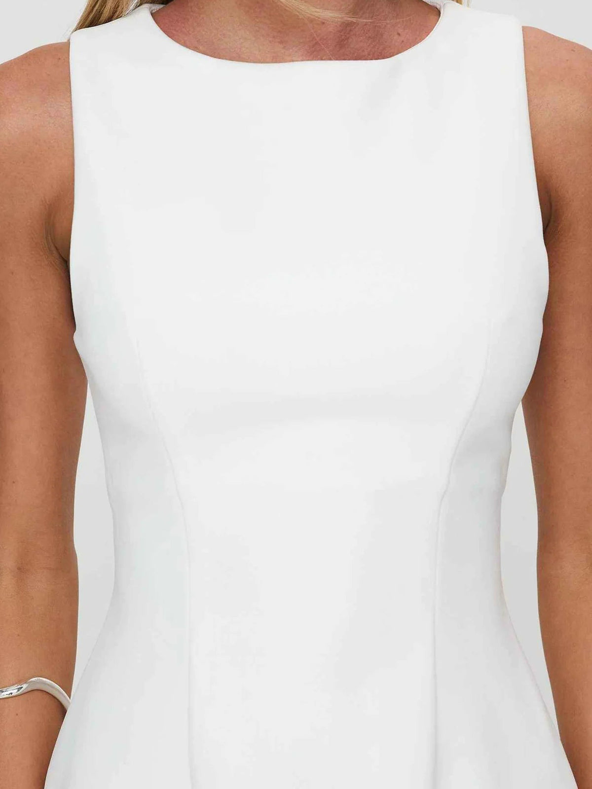 Ivory sleeveless boat-neck mini dress bodice close-up
