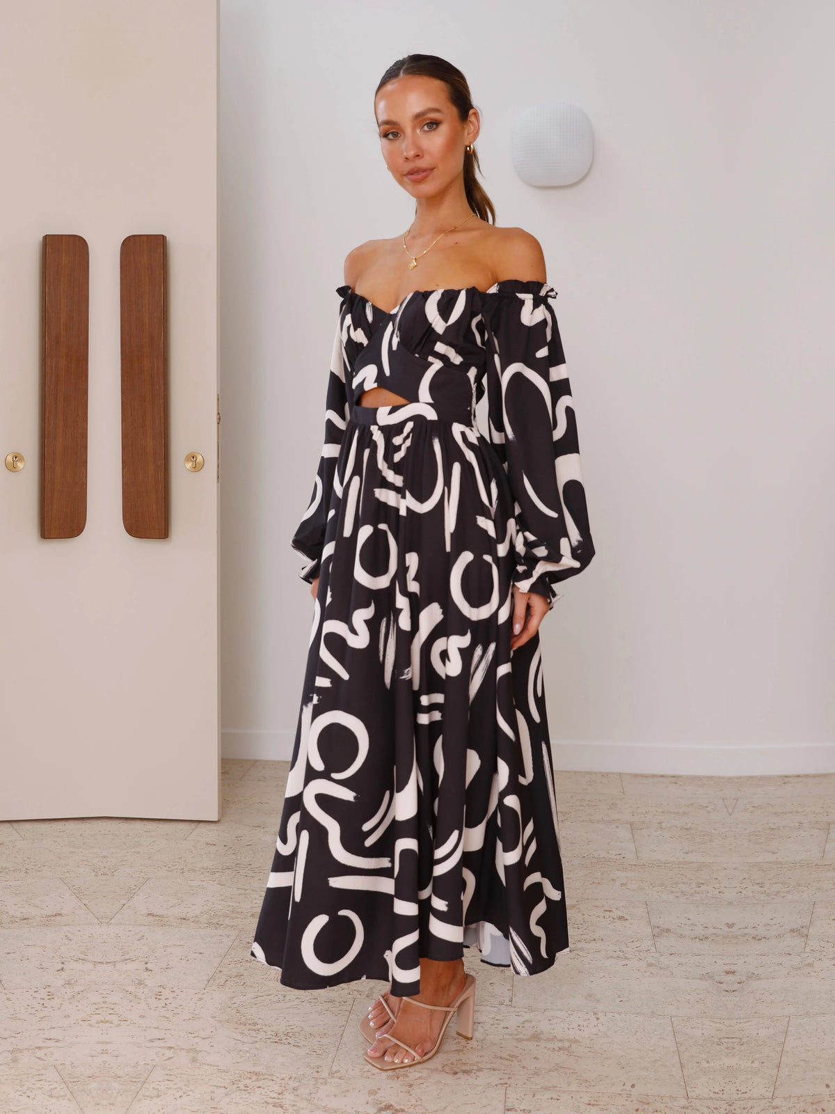 Black a-line maxi formal dress with printed pattern, alternate view showing the skirt