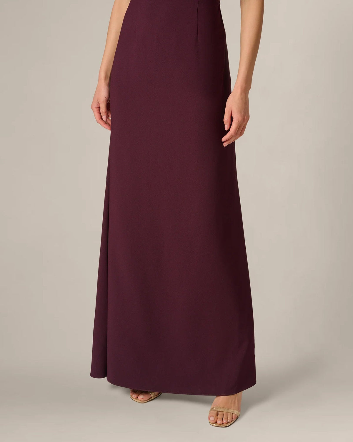 Burgundy wine A-line maxi dress with flowing skirt and slight flare at hem