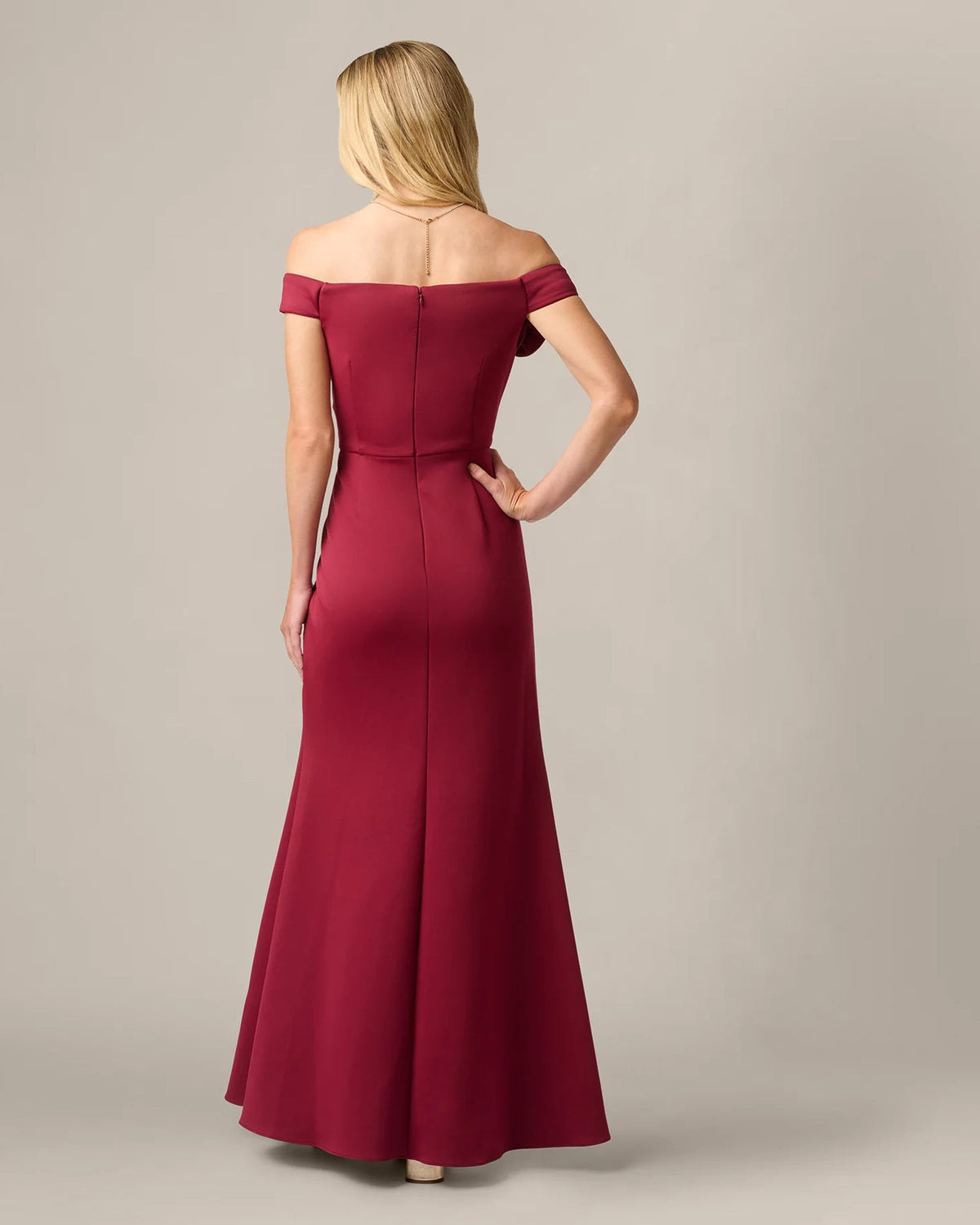 Crimson red off-shoulder mermaid maxi dress, back view with center seam