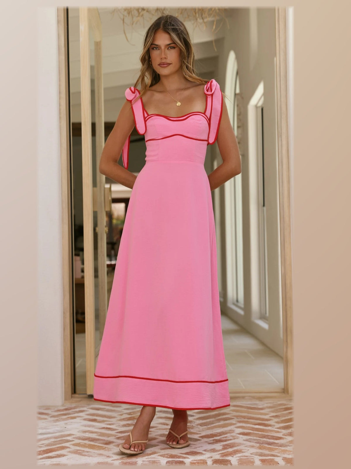 Pink midi formal dress, alternate full-length view showing the hem