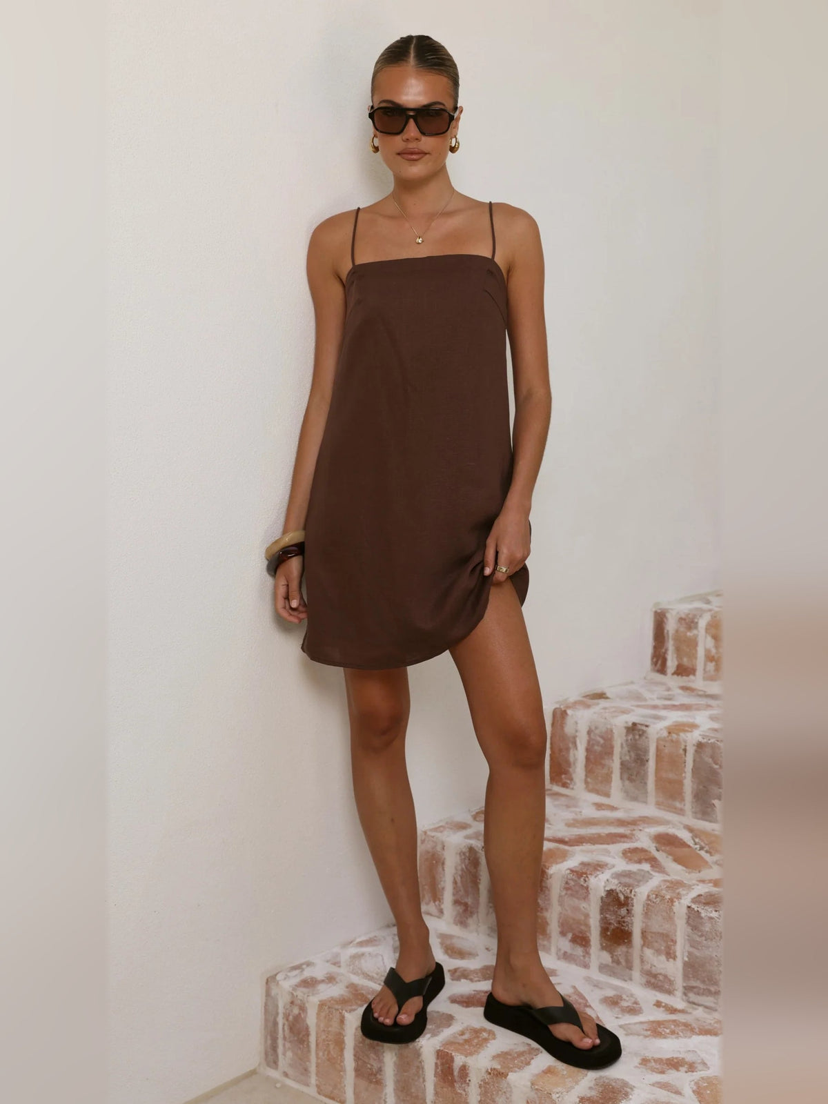 Brown mini homecoming dress, spaghetti straps, fitted bodice, draped hem