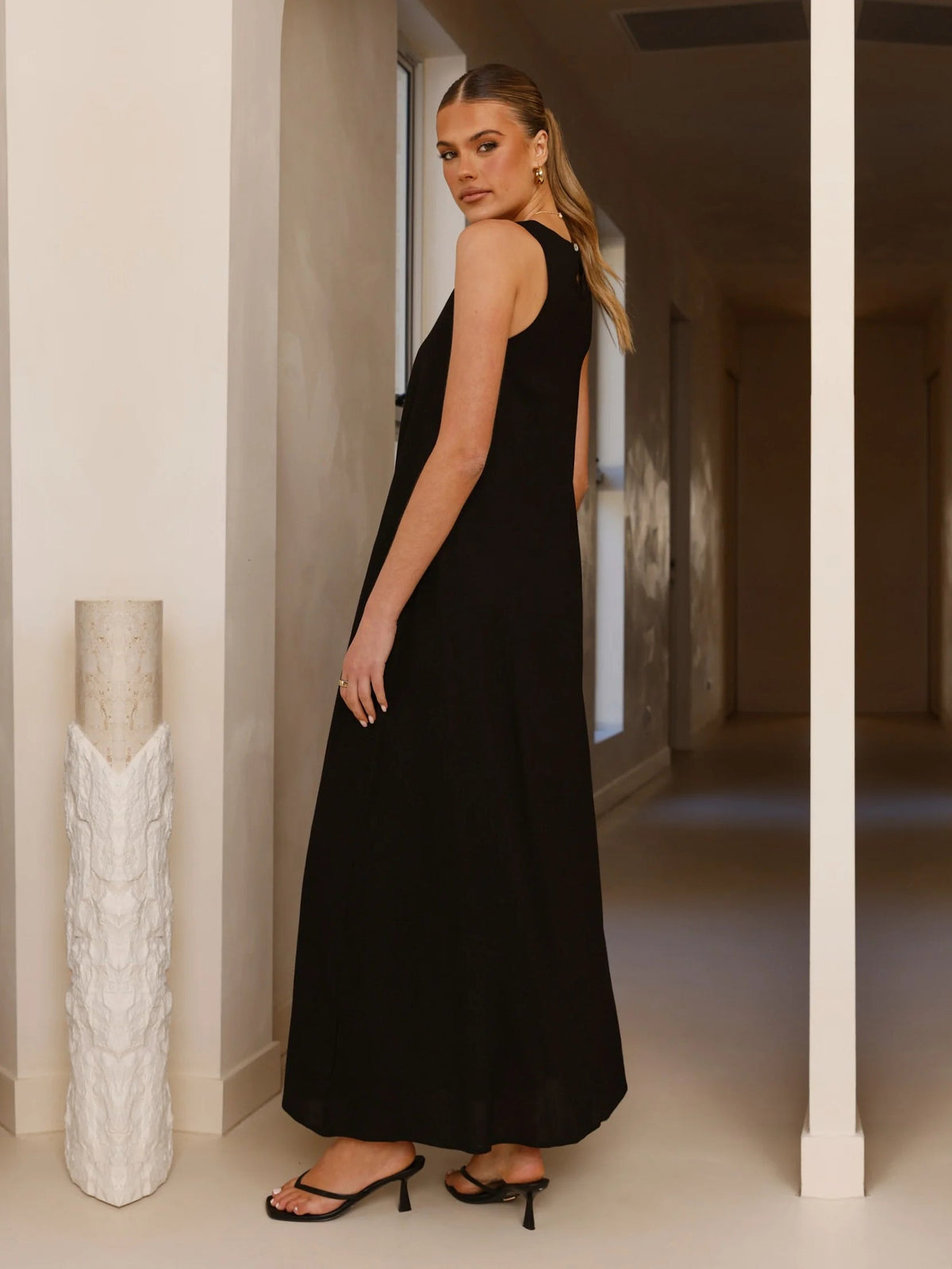 Black a-line maxi formal dress with a-line, alternate view showing the skirt