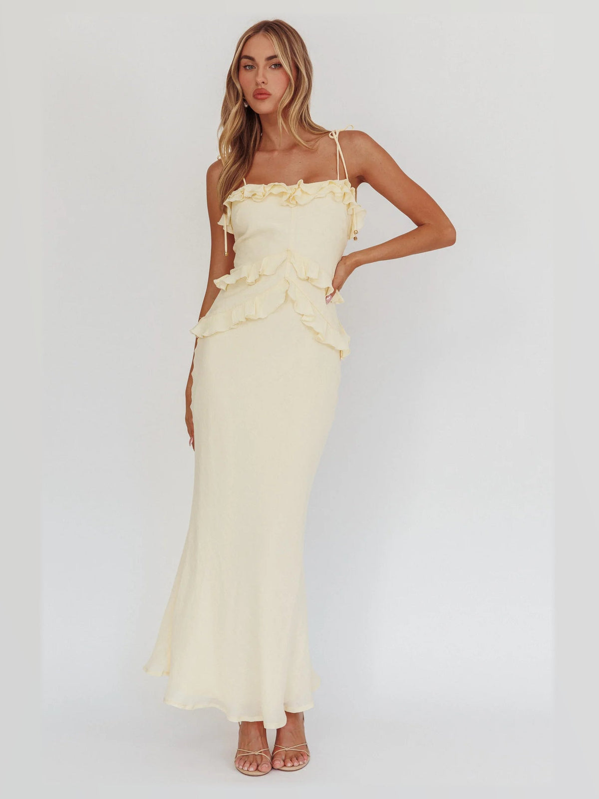 Yellow maxi formal dress, alternate full-length view showing the hem