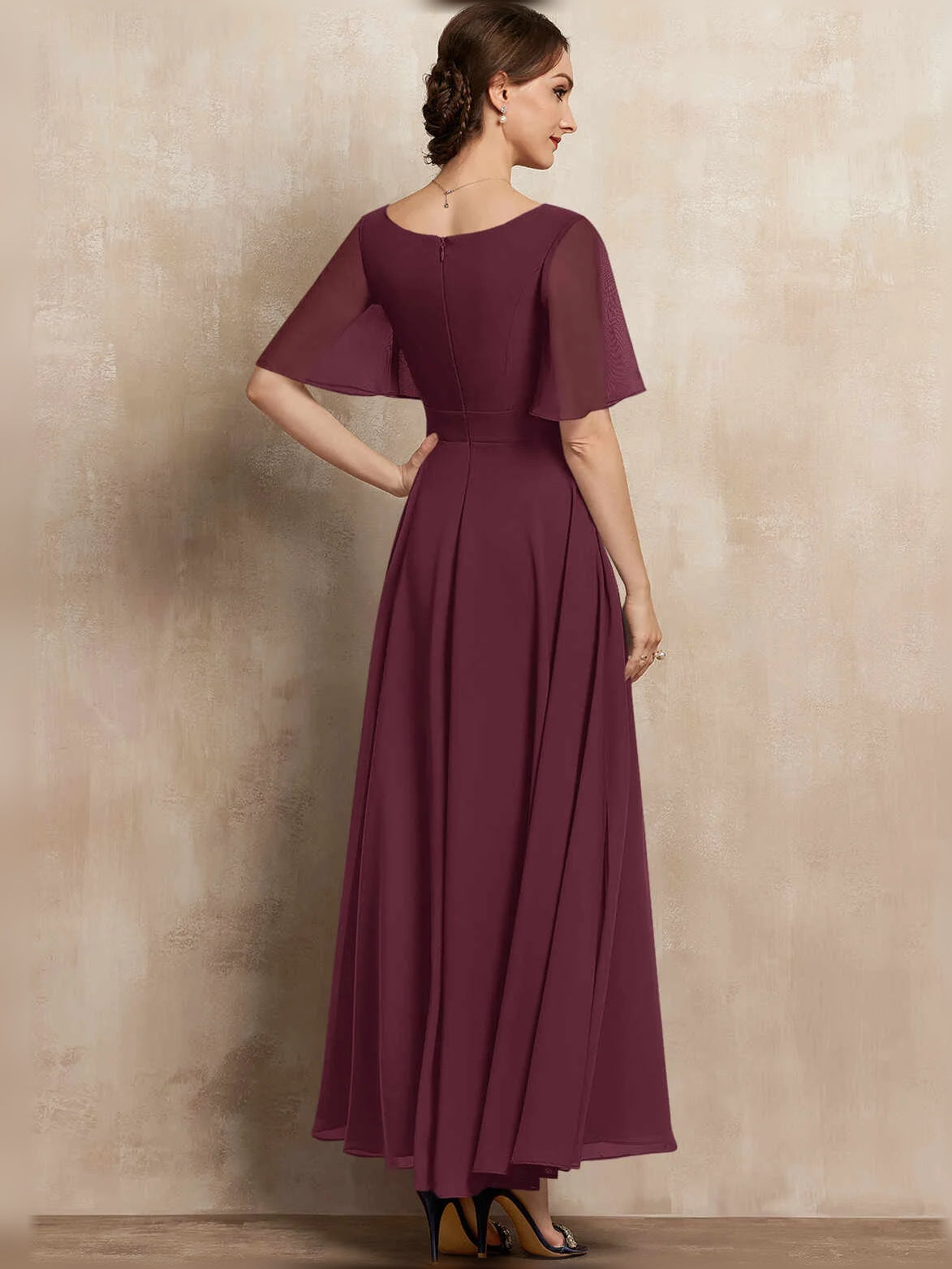Deep red chiffon maxi dress with V-neck, pleated A-line skirt, flutter sleeves, and beaded waist