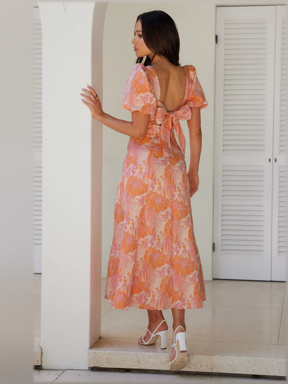 Backless midi formal dress with coral floral print, puff sleeves, open square back with tie