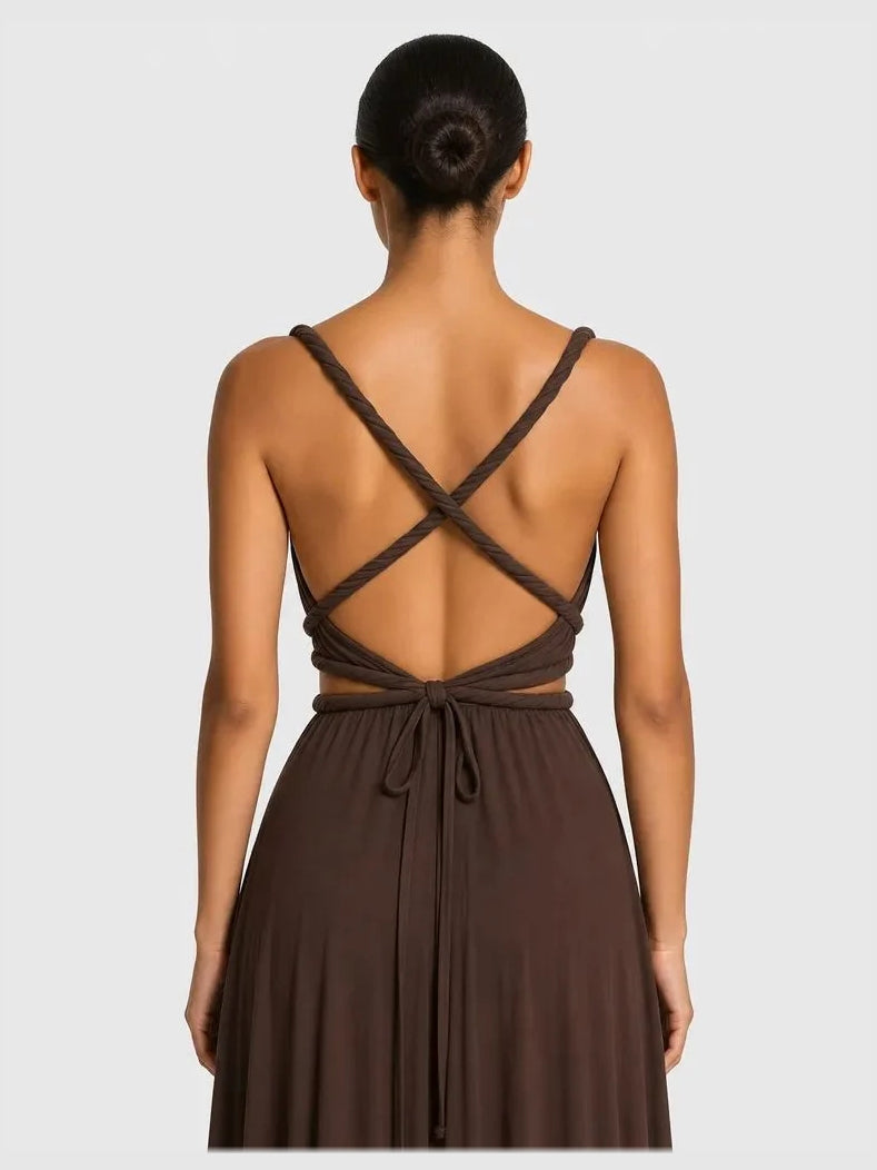 Chocolate-brown open-back maxi dress with crisscross straps and center waist tie