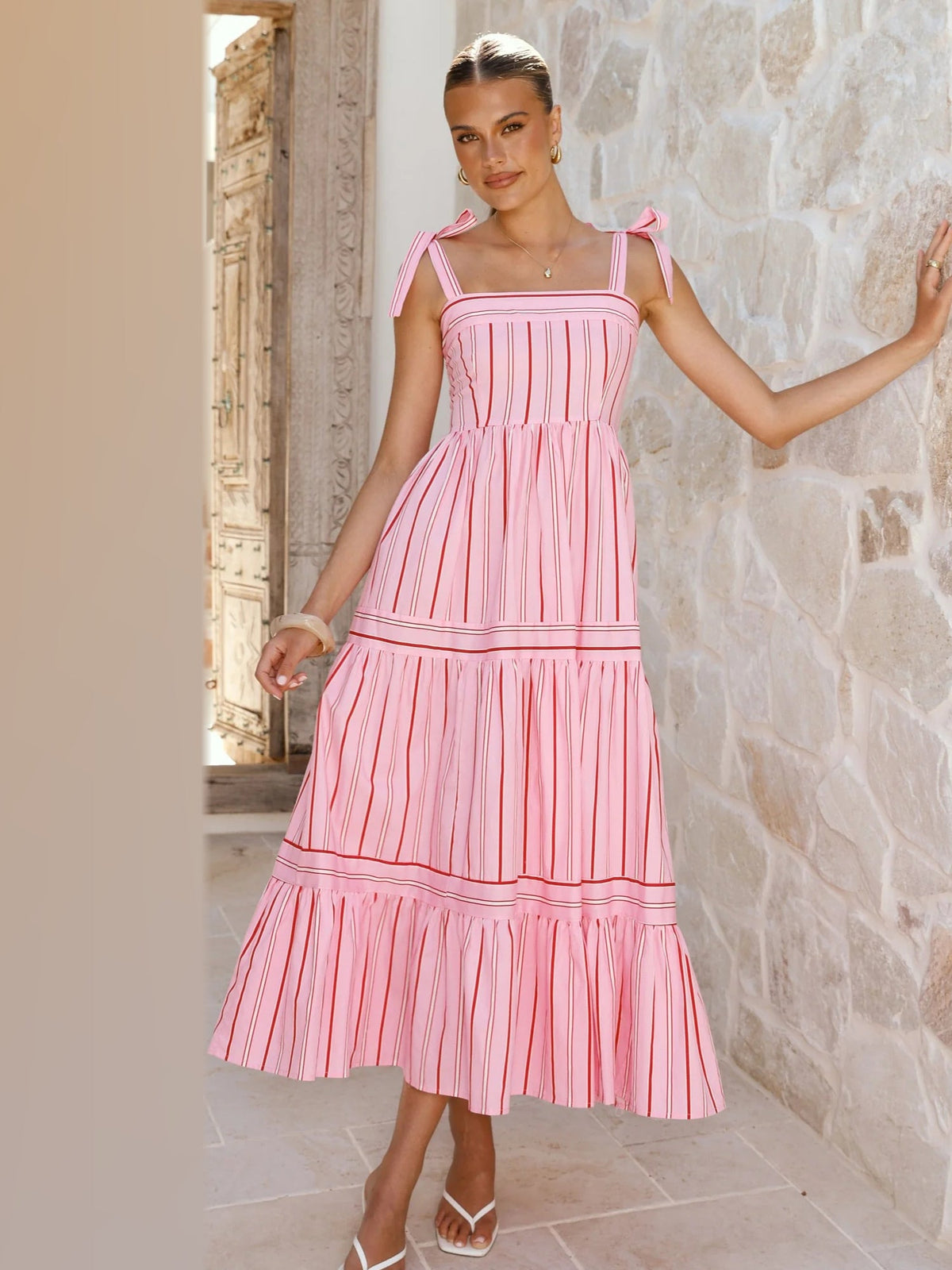 Pink midi formal dress, alternate full-length view showing the hem