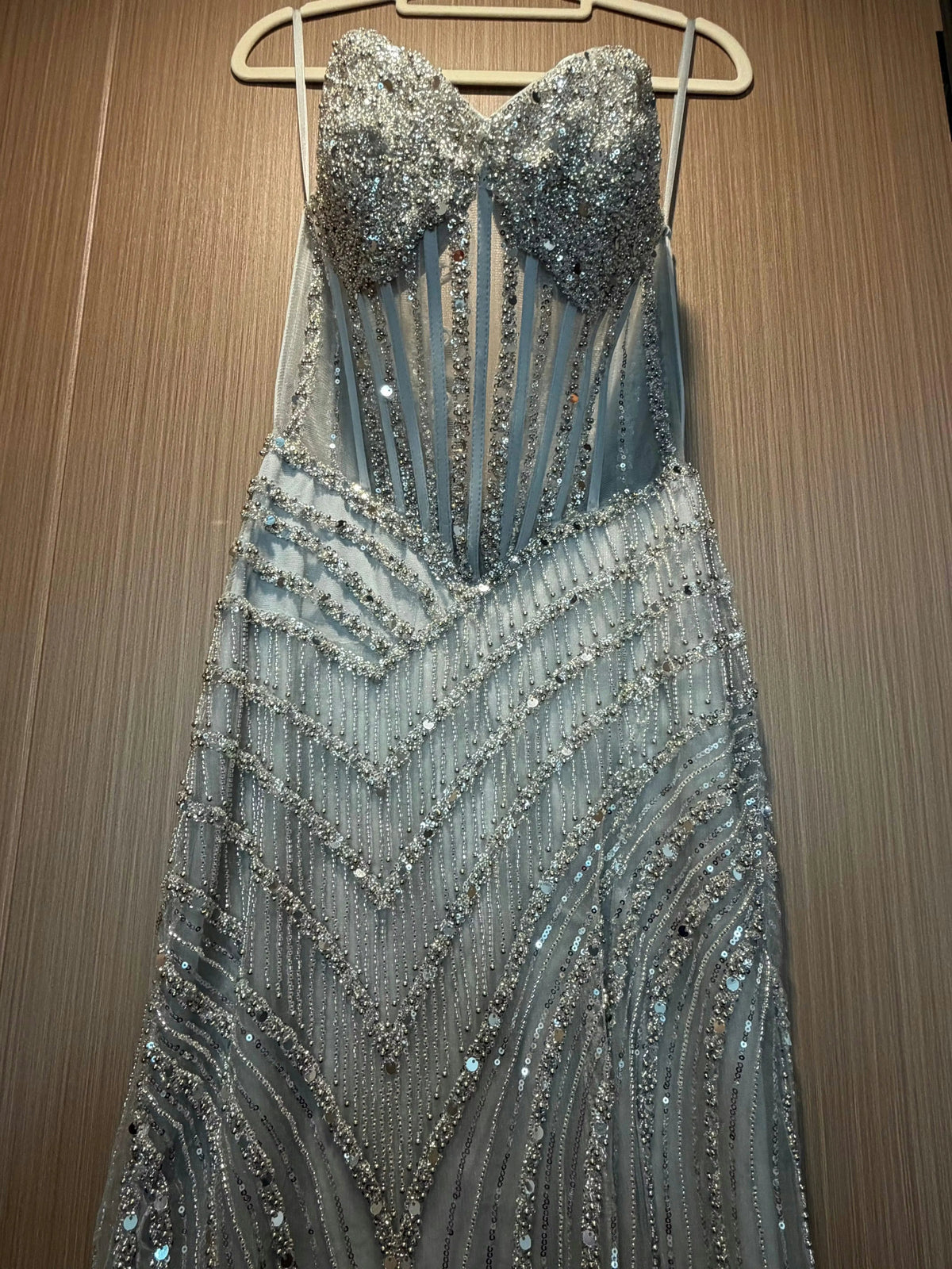 Silver beaded corset bodice with chevron sequin detailing on formal dress.