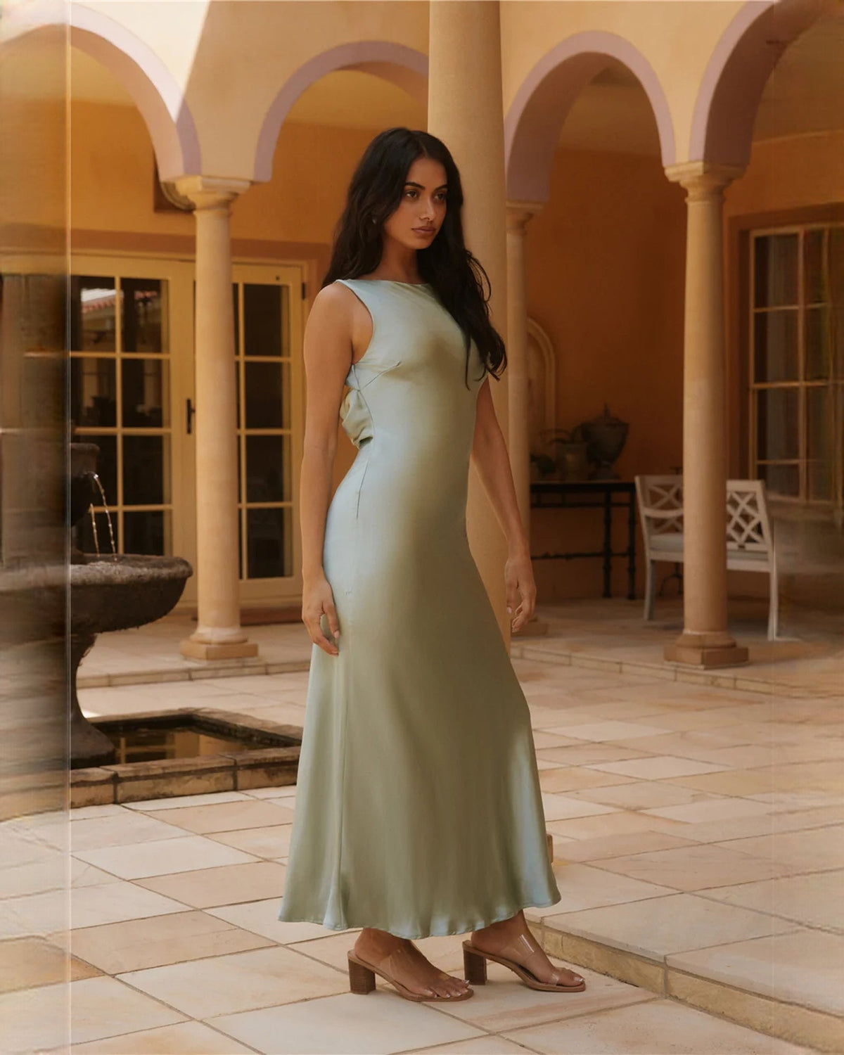 Sage green satin A-line midi bridesmaid dress, sleeveless, gently flared skirt