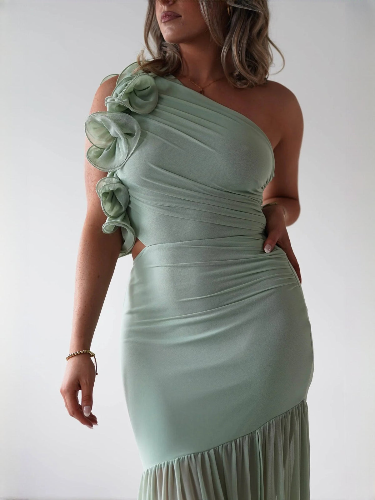 Sage fit-and-flare maxi formal dress with pleated skirt, alternate full-length view showing the skirt