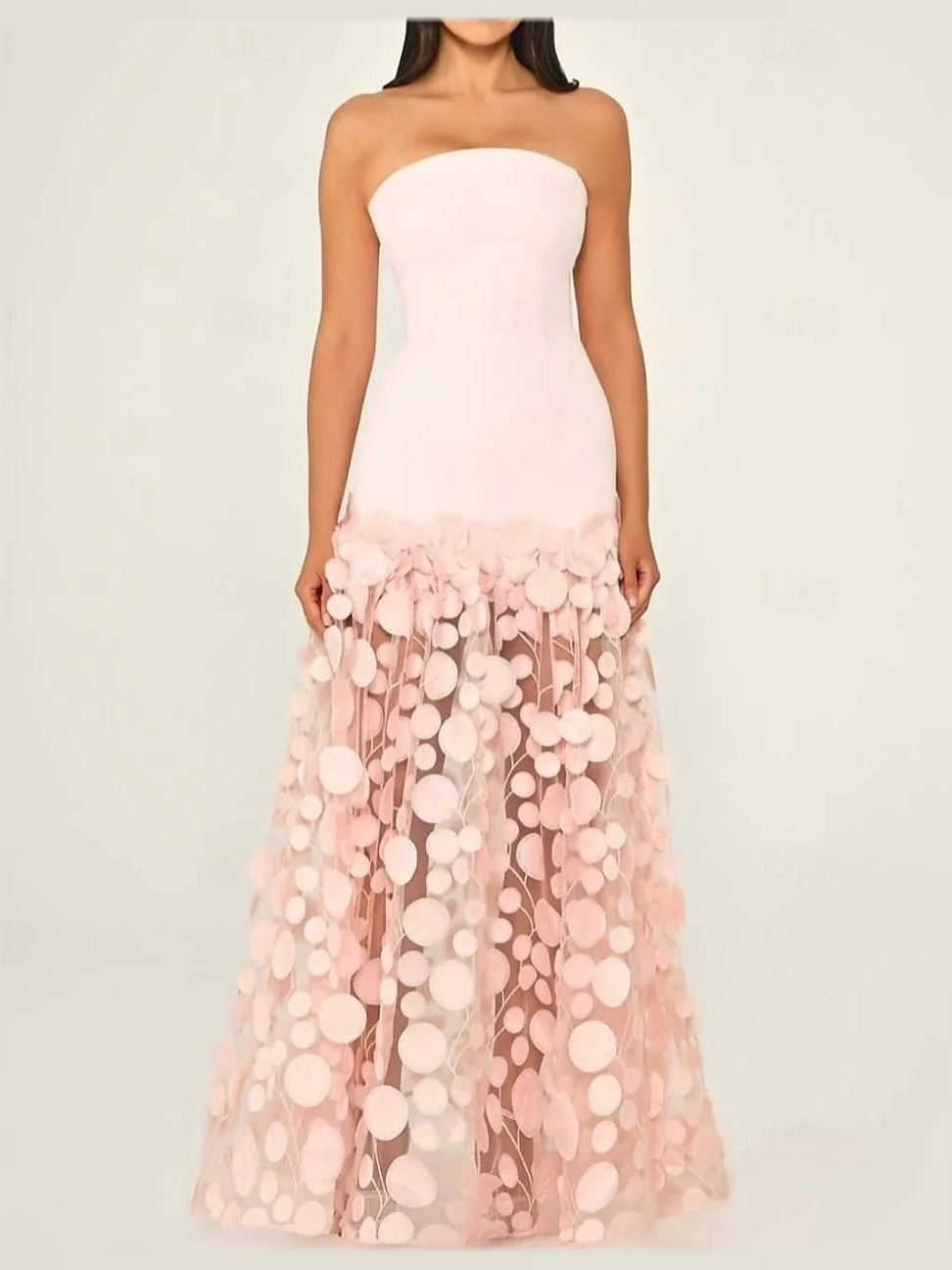 Strapless mermaid prom dress with pale pink bodice and layered tulle skirt