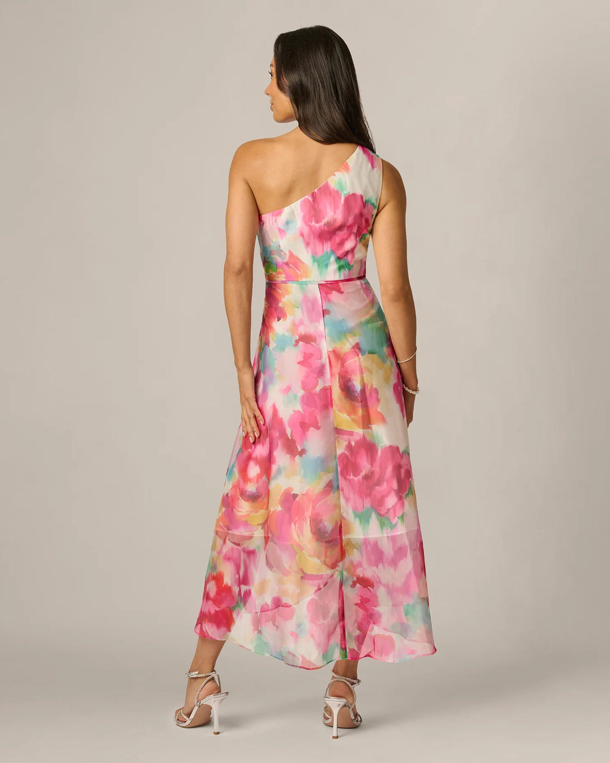 One-shoulder midi dress, back view, pink and green floral watercolor print.
