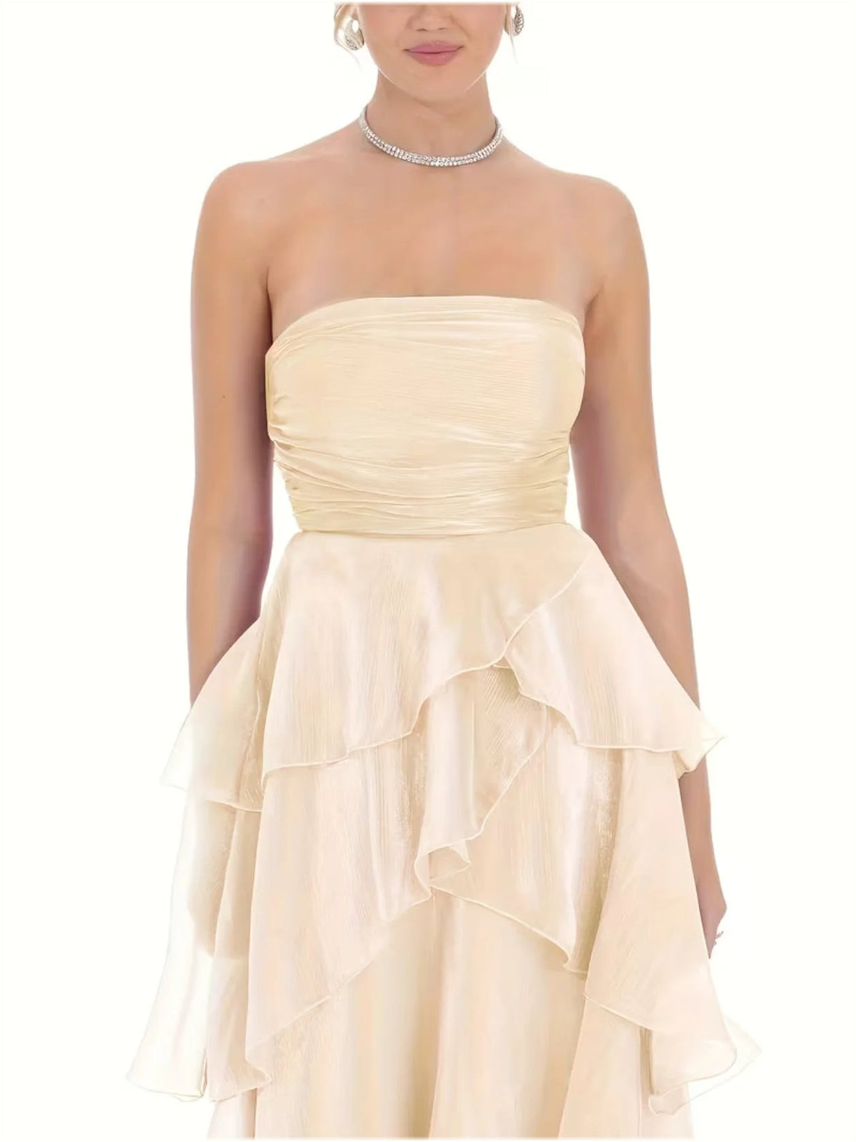 Apricot strapless sweetheart wedding dress with tiered ruffle layers and soft drape bodice
