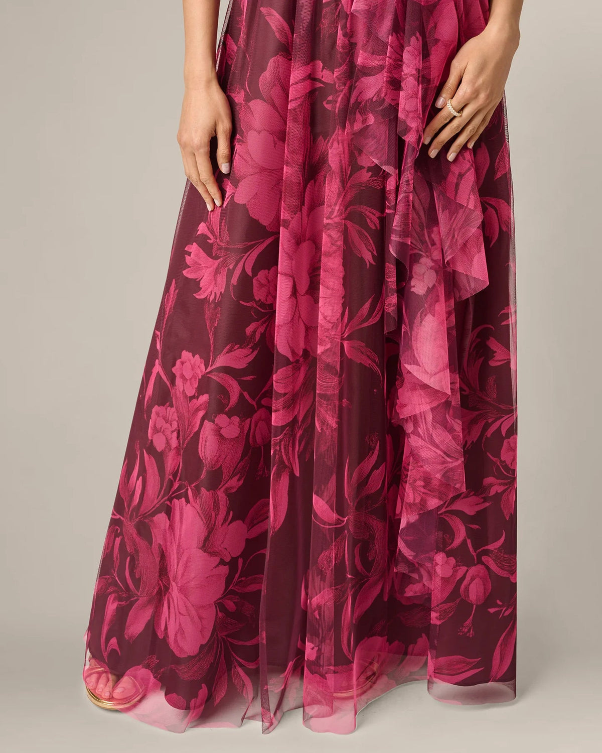 Burgundy floral maxi skirt with flowing A-line silhouette and sheer layered fabric