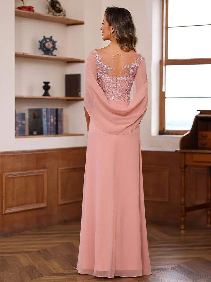 Floor-length dusty pink chiffon mother of the bride dress with sheer beaded back