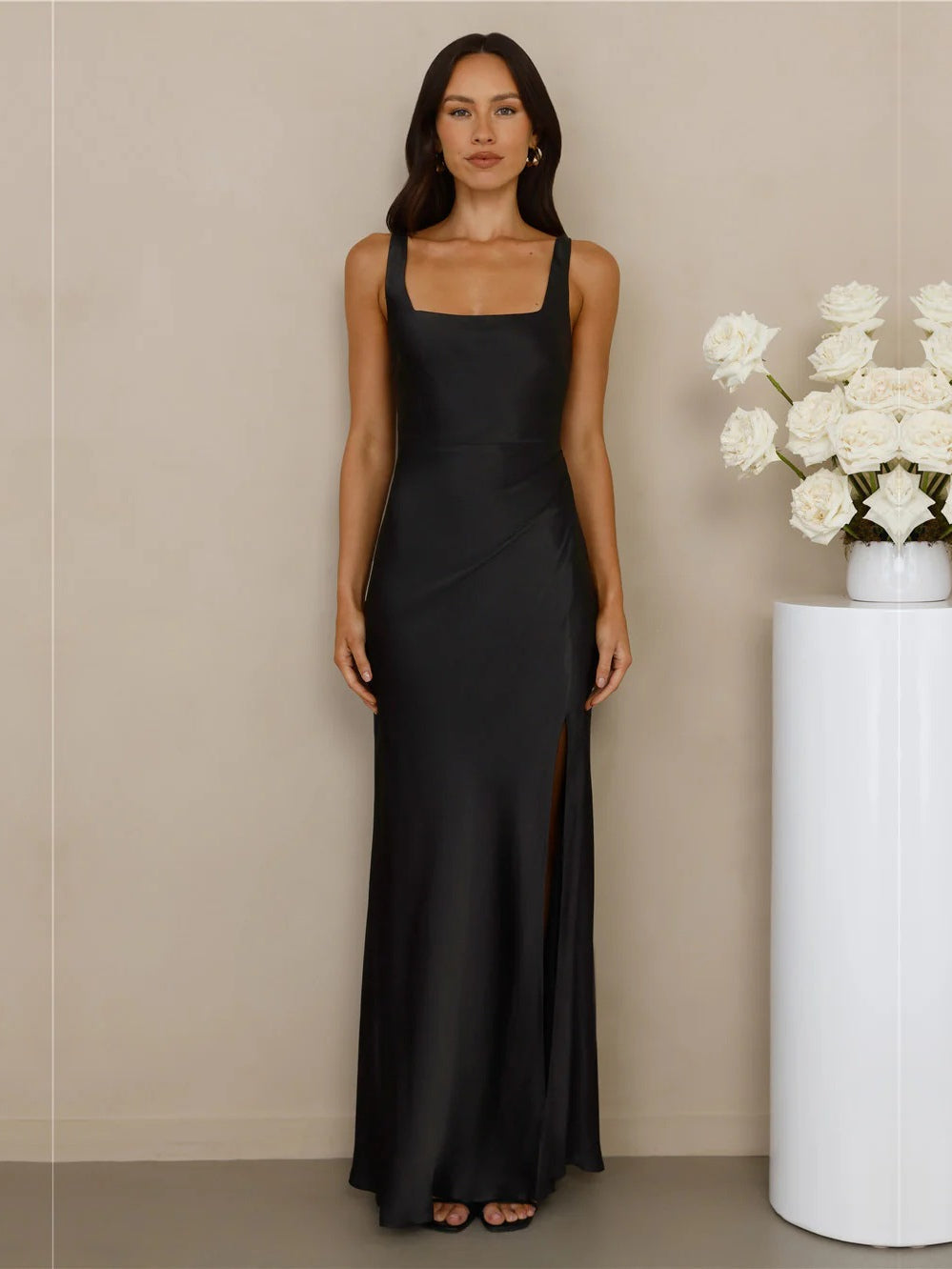 Black sheath maxi formal dress with skirt slit, alternate view showing the skirt