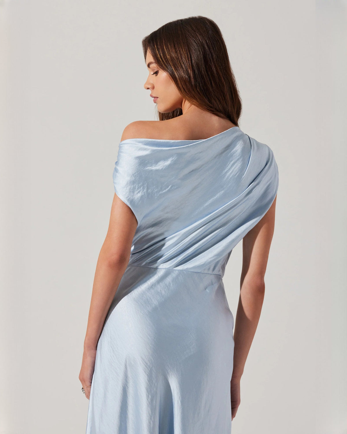 Light blue satin sleeveless midi dress back with wrap drape and gathered waist
