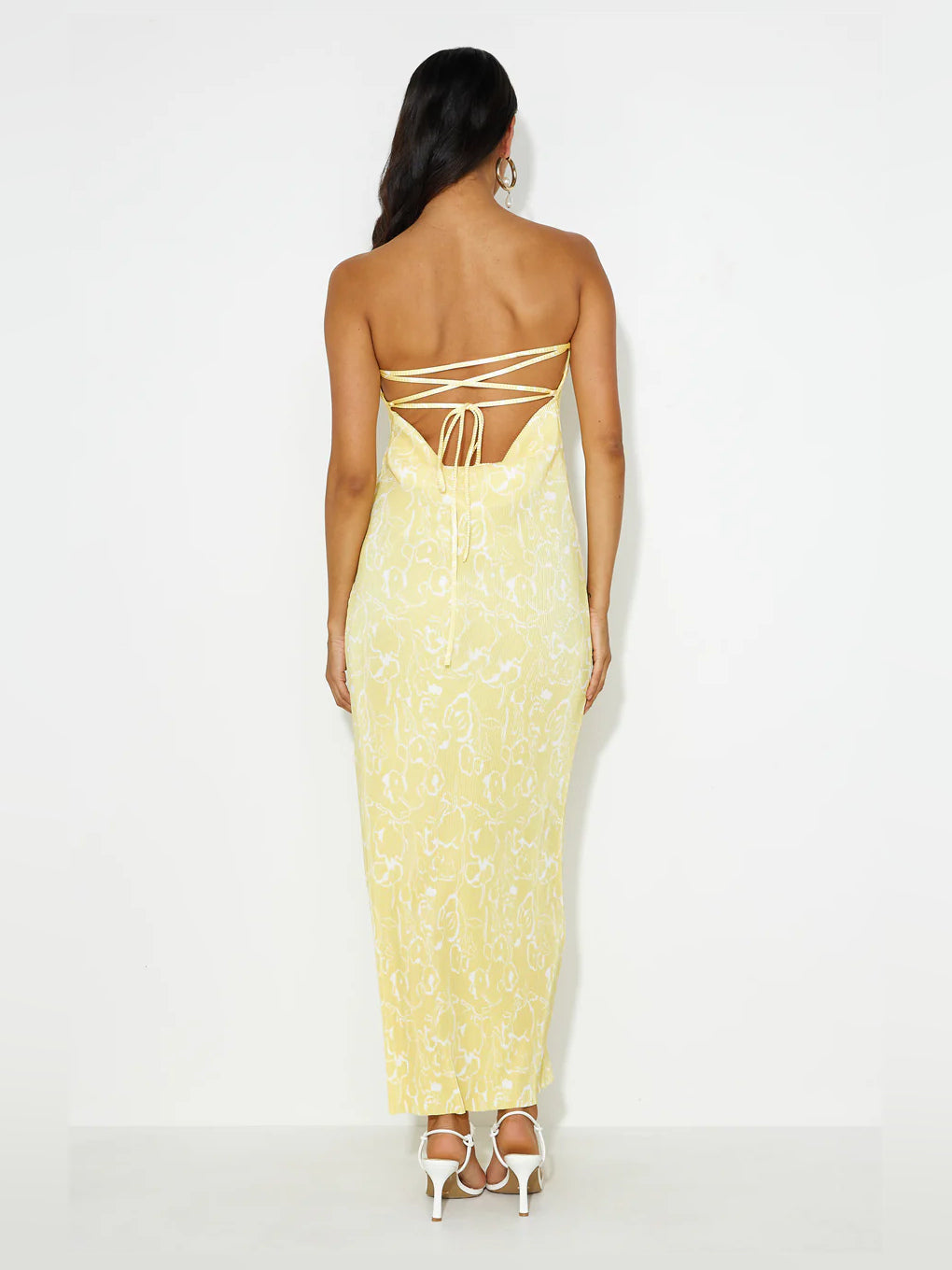 Yellow sheath maxi formal dress with strapless neckline, alternate full-length view showing the skirt