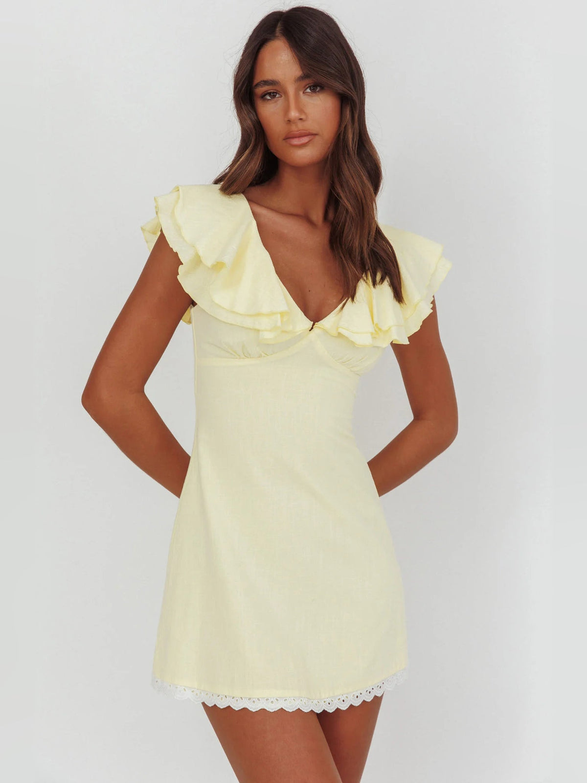Butter layered ruffled mini dress with ruffled shoulders and lace-trim hem