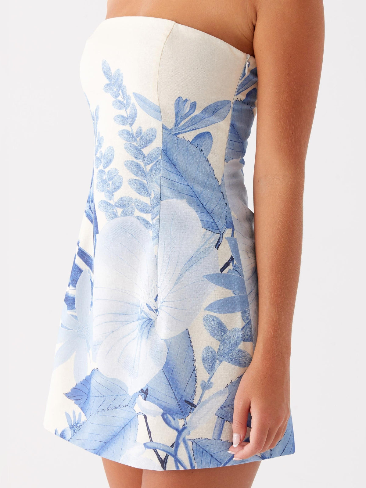 Blue floral strapless mini homecoming dress with diagonal flower print on skirt