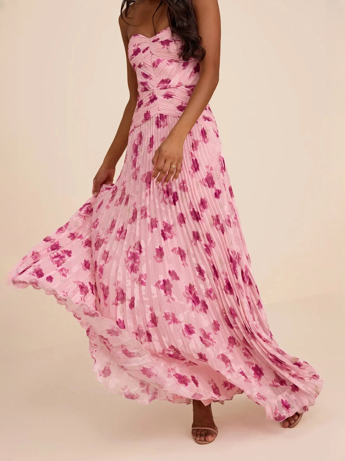 Dusty pink floral chiffon maxi dress with ruched bodice and flowing pleated A-line hem
