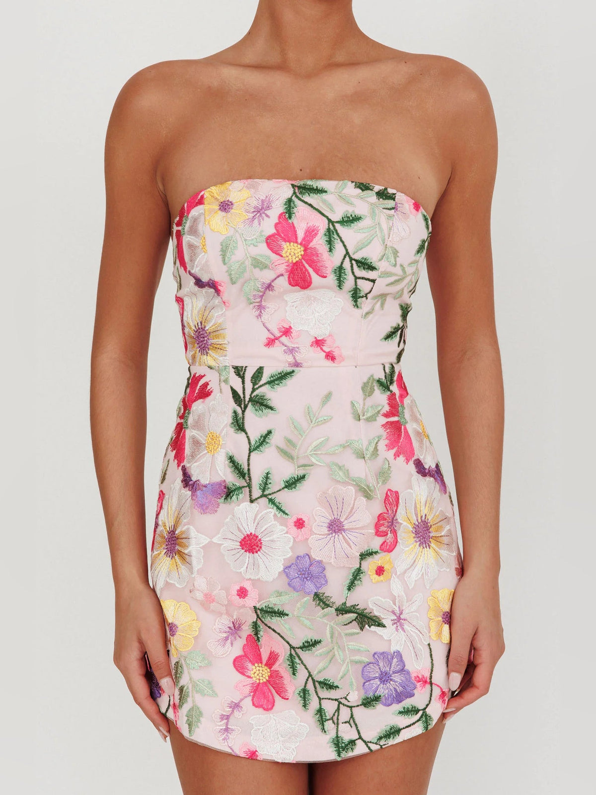 Floral strapless mini dress close-up, sweetheart neckline and stitched waist seam
