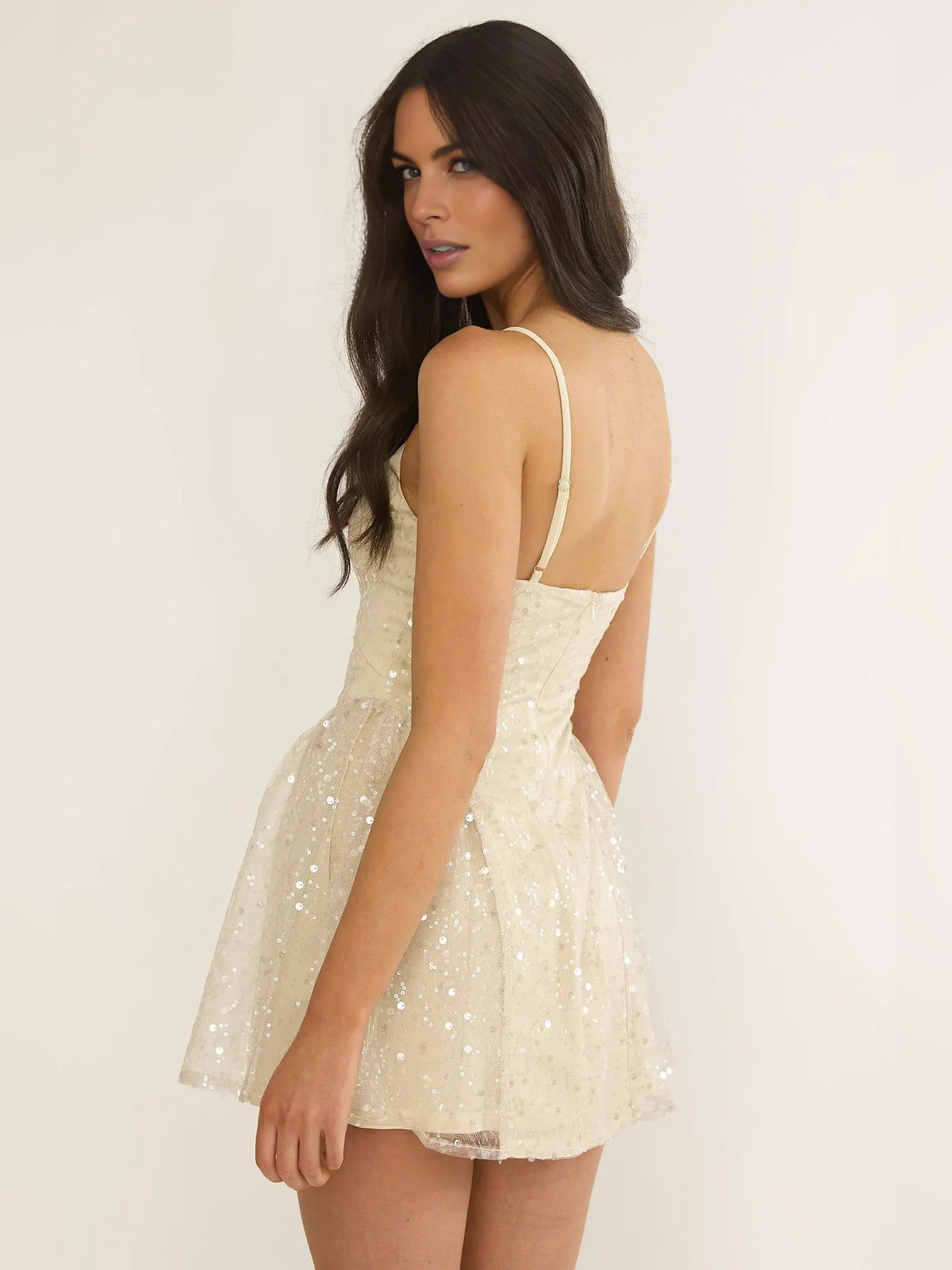 Champagne sequin V-neck A-line mini tulle dress shown from the side