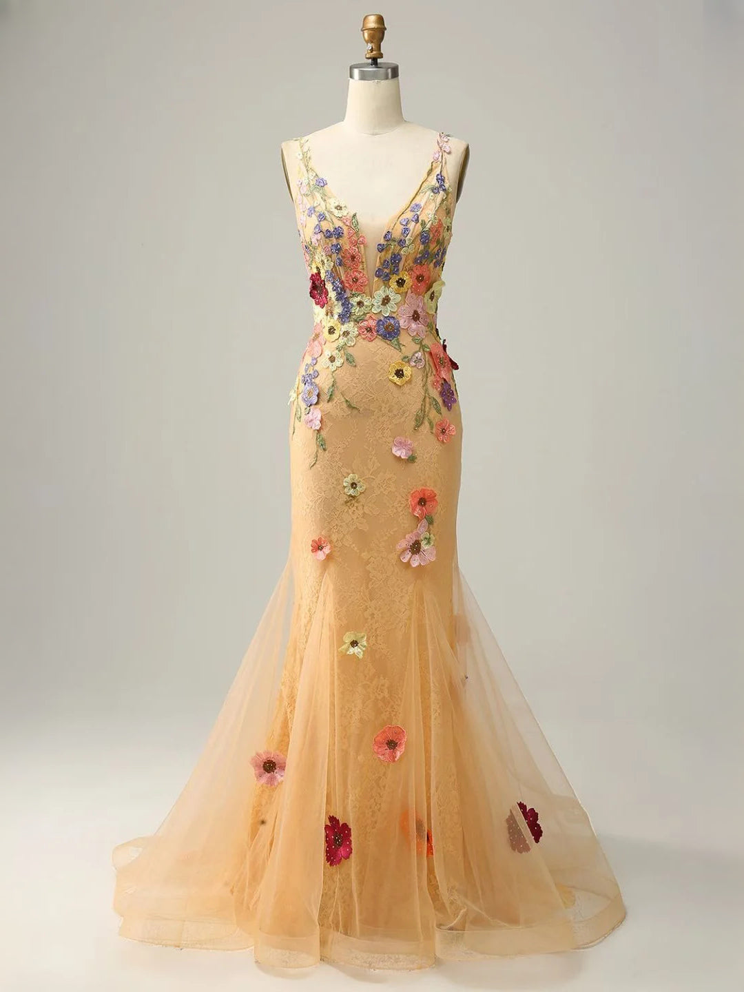 Peach tulle mermaid gown with V-neck floral appliques and full flowing skirt